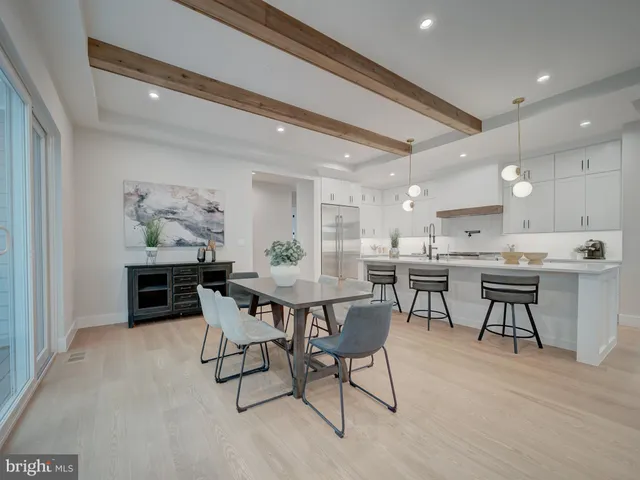 a spacious bedroom with a bed and window