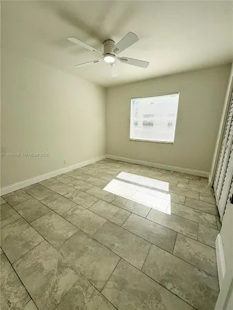 a view of a hallway with a window