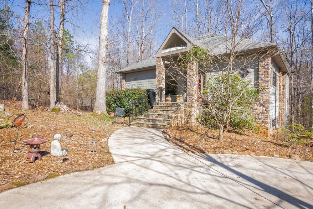 3146 East Fairview Road Southwest McDonough, GA 30252 - Photo 1 of 1 This architect designed home sits on 2.2 acres with a peaceful creek. You must see its open plan living area, luxurious owner's suite, 3 outdoor decks, and large garage/workshop.
