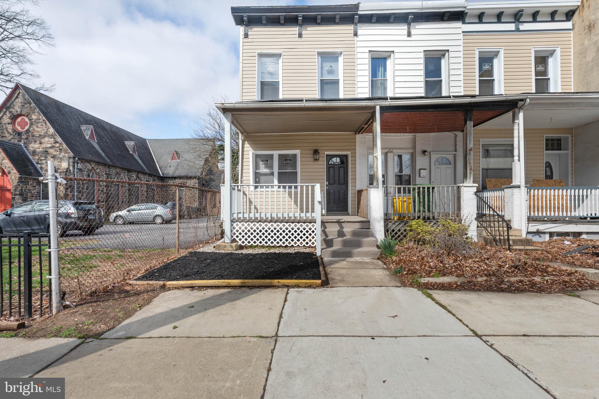 3988 Roland Avenue Baltimore, MD 21211 - Photo 1 of 31 a front view of a house with a yard