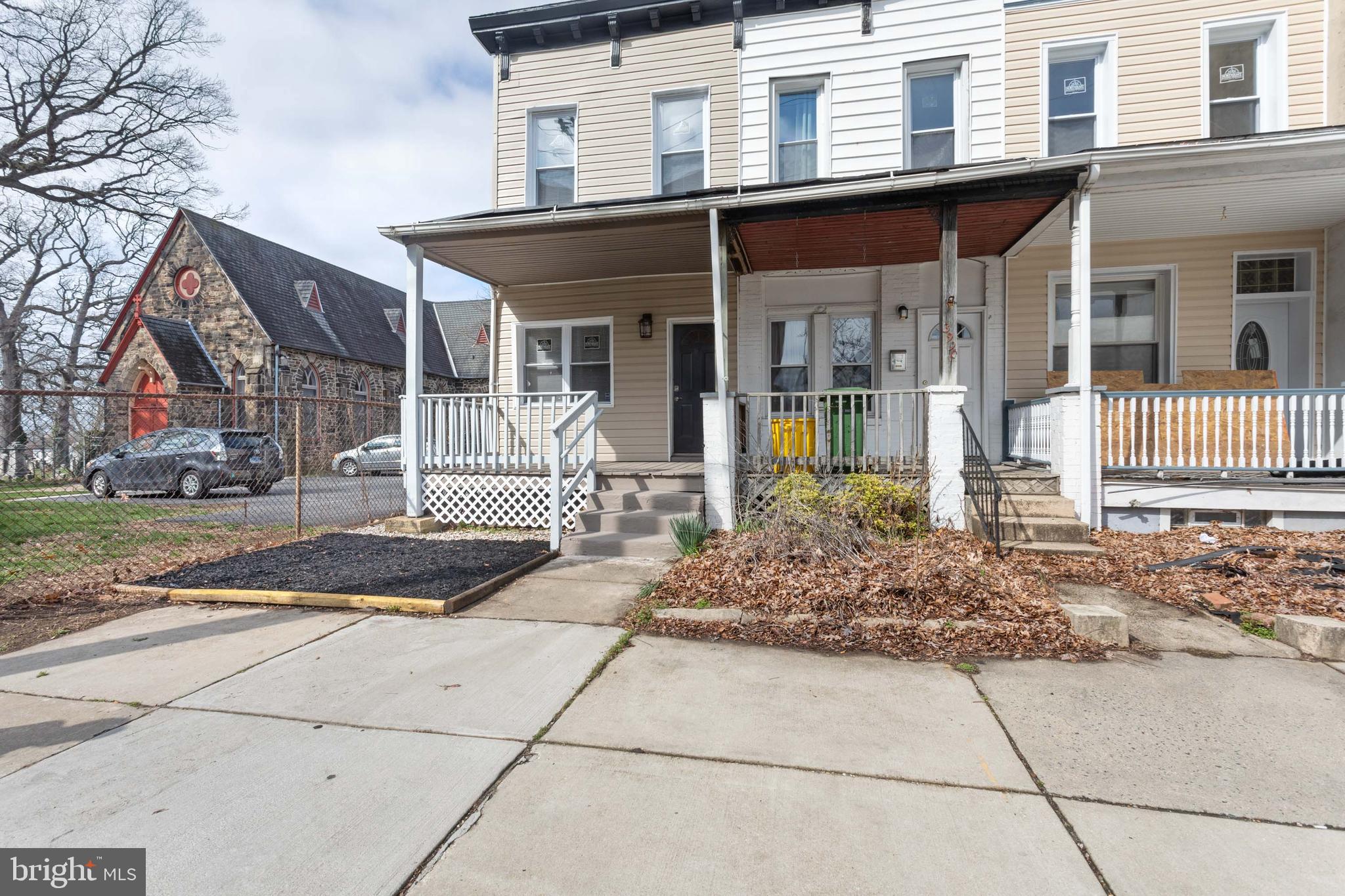 3988 Roland Avenue Baltimore, MD 21211 - Photo 3 of 31 a front view of a house with garden