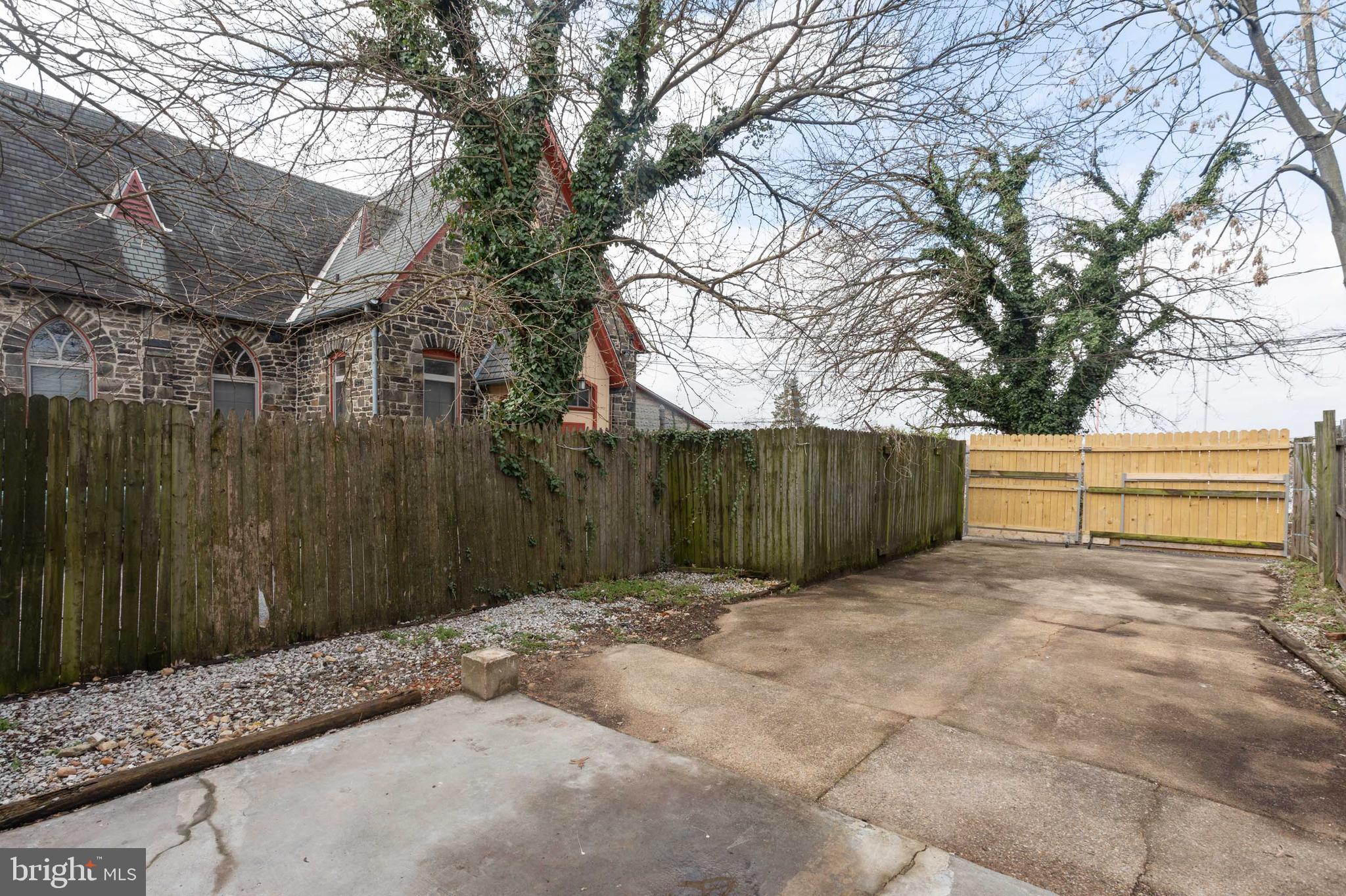 3988 Roland Avenue Baltimore, MD 21211 - Photo 27 of 31 a view of backyard with wooden fence