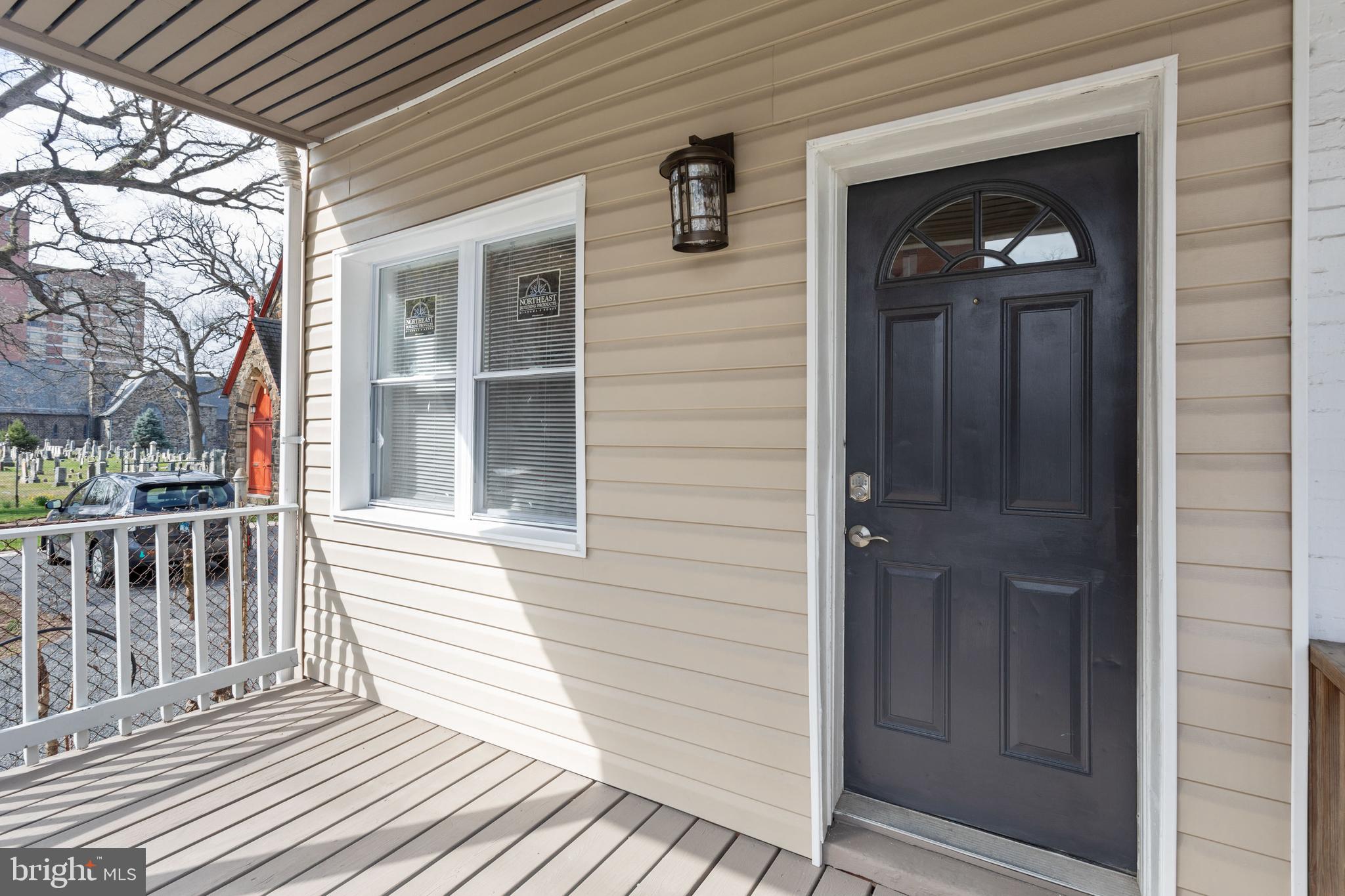 3988 Roland Avenue Baltimore, MD 21211 - Photo 5 of 31 a view of a balcony with wooden floor