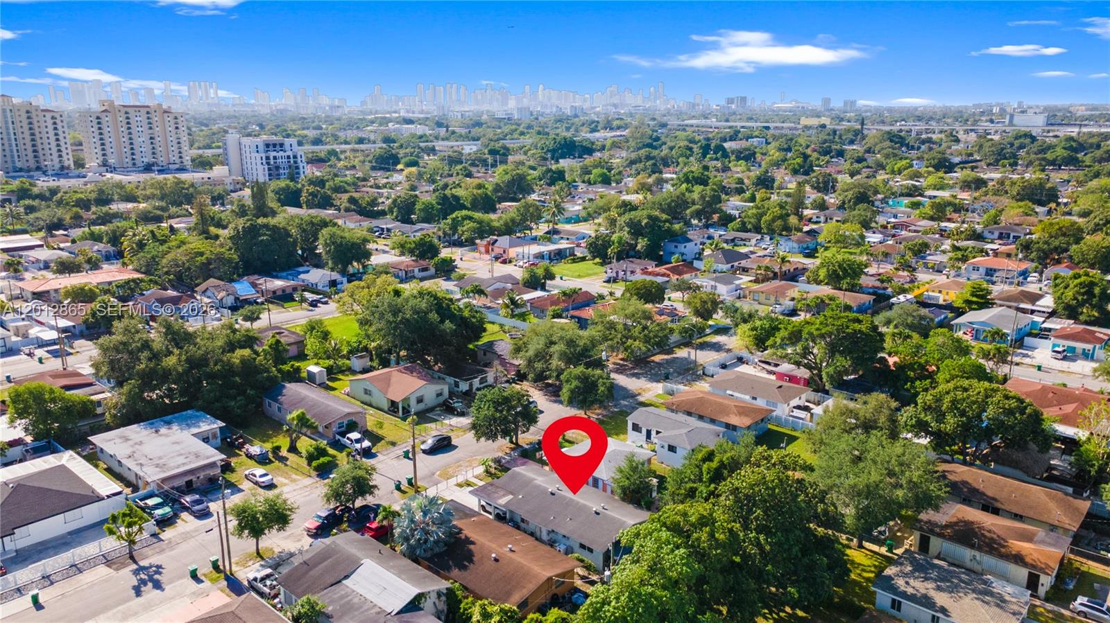 5300 Northwest 30th Place Miami, FL 33142 - Photo 29 of 35 an aerial view of residential houses with outdoor space and street view