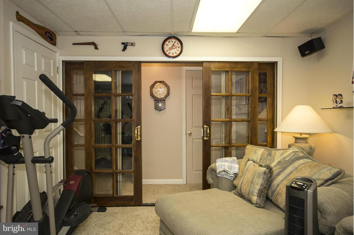 834 Brickston Road Reisterstown, MD 21136 - Photo 17 of 23 Family Room with Custom Wood Doors