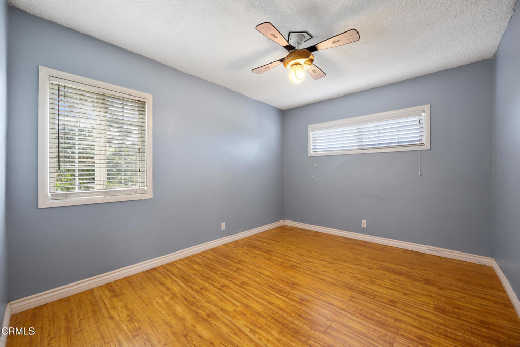 6940 Bellclaire Street Tujunga, CA 91042 - Photo 20 of 47 a view of an empty room with a window