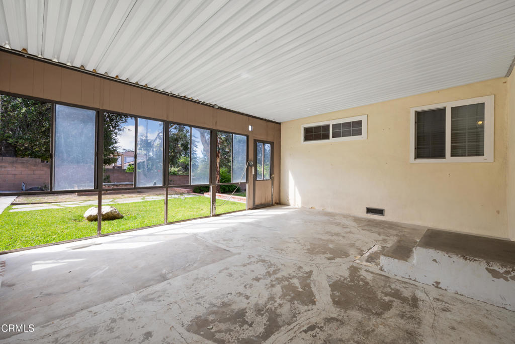 6940 Bellclaire Street Tujunga, CA 91042 - Photo 35 of 47 a view of an empty room with window