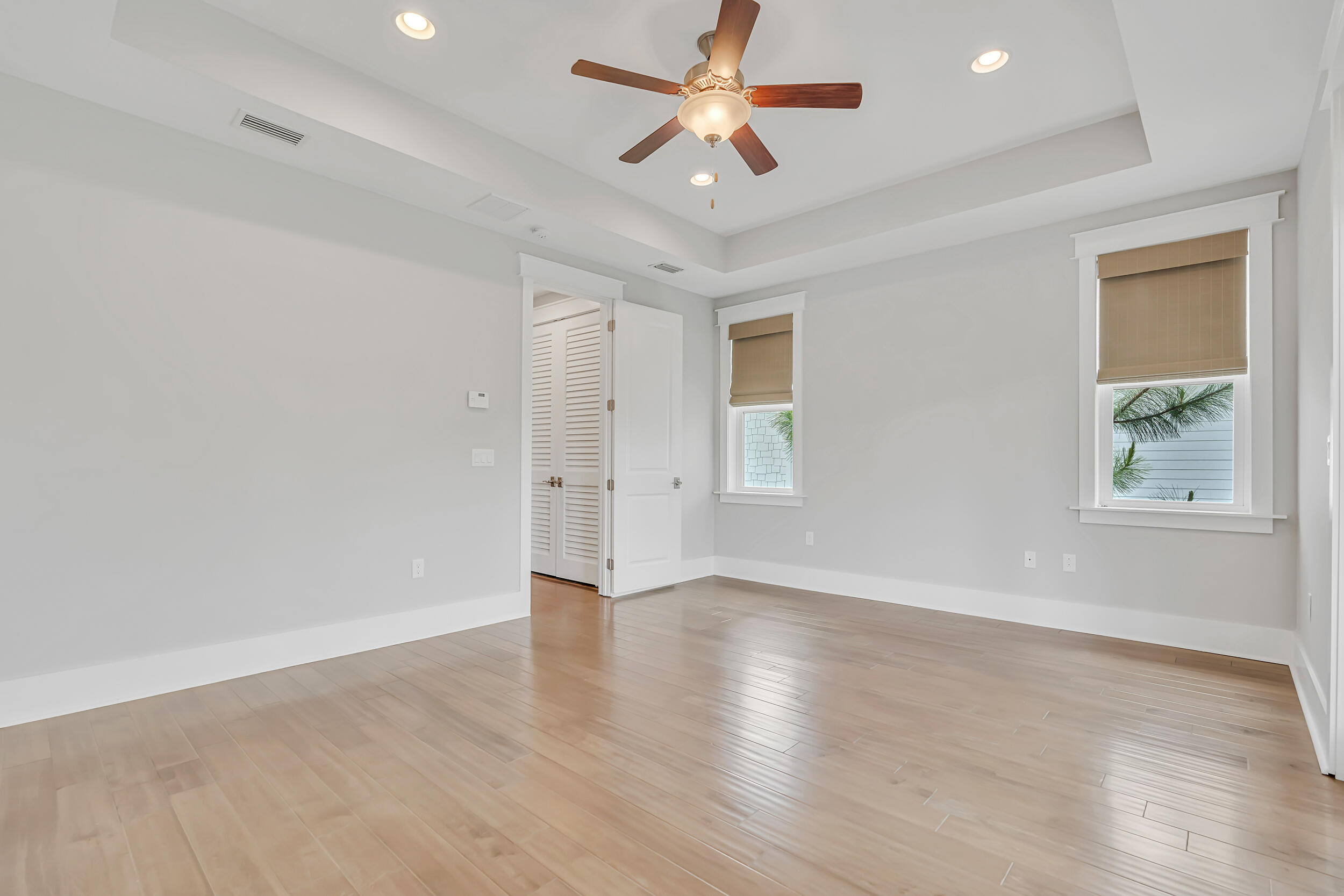 345 Flatwoods Forest Loop Santa Rosa Beach, FL 32459 - Photo 24 of 62 wooden floor in an empty room with a window