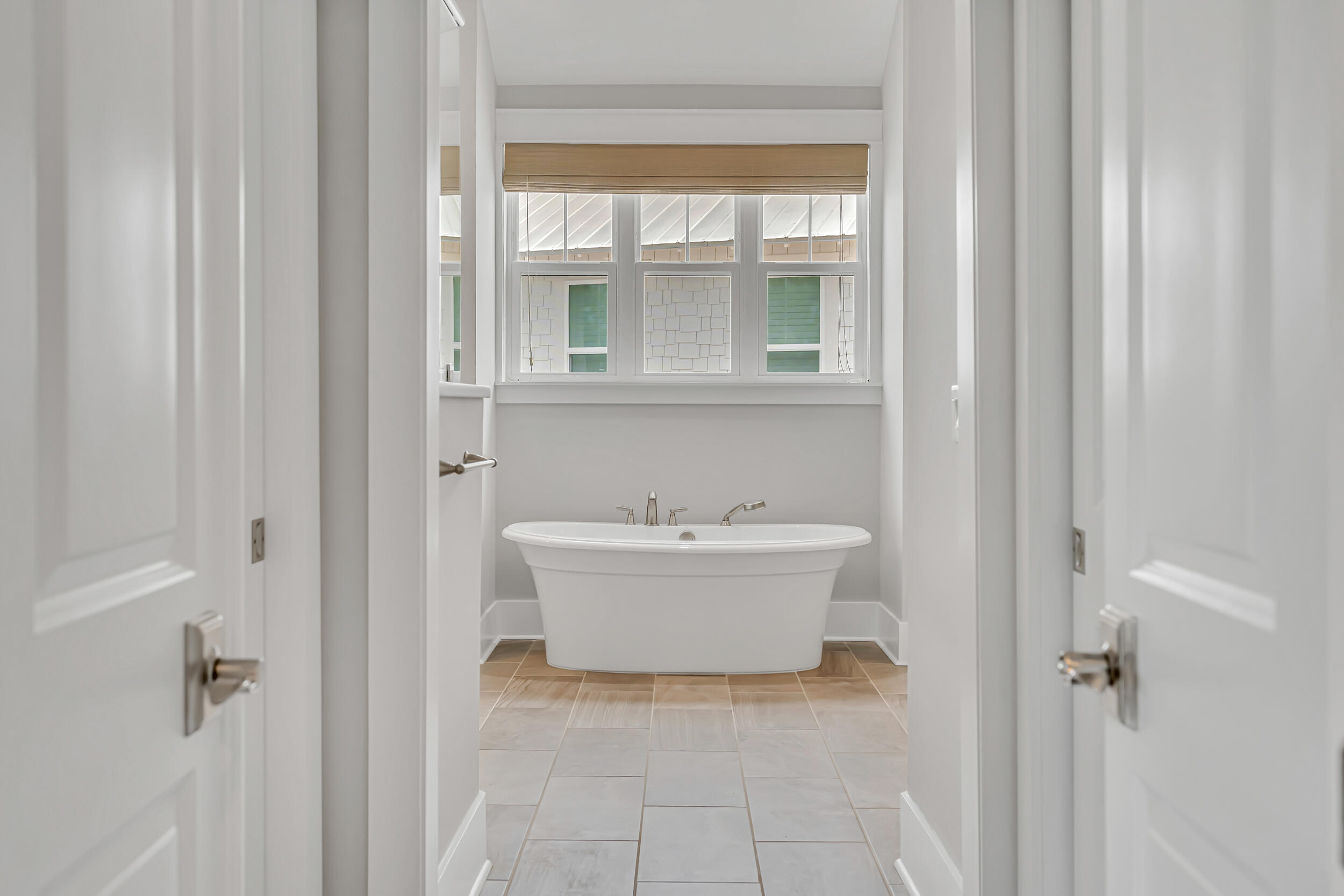 345 Flatwoods Forest Loop Santa Rosa Beach, FL 32459 - Photo 25 of 62 a bathroom with a bathtub and shower