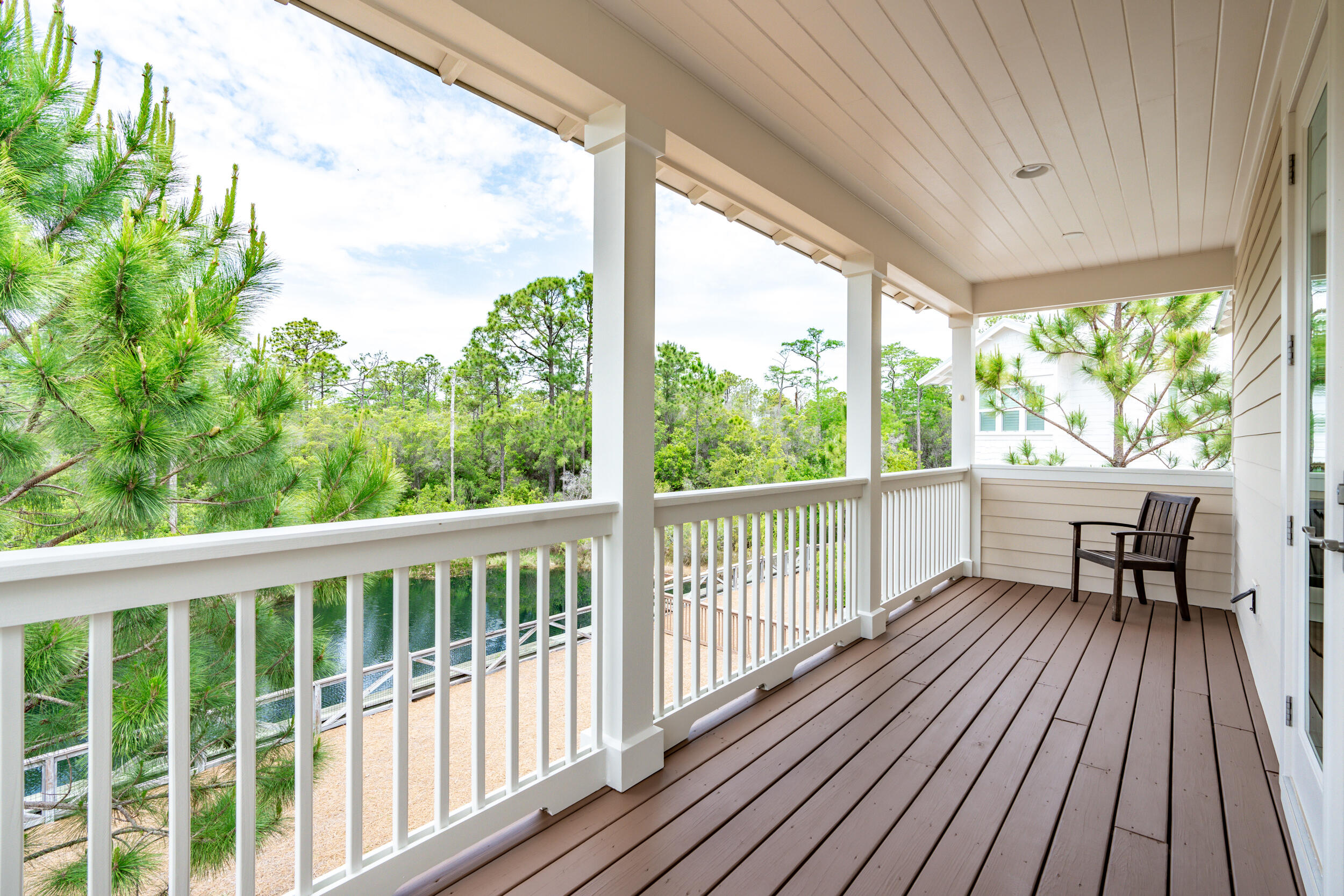 345 Flatwoods Forest Loop Santa Rosa Beach, FL 32459 - Photo 28 of 62 a view of a two chairs in balcony
