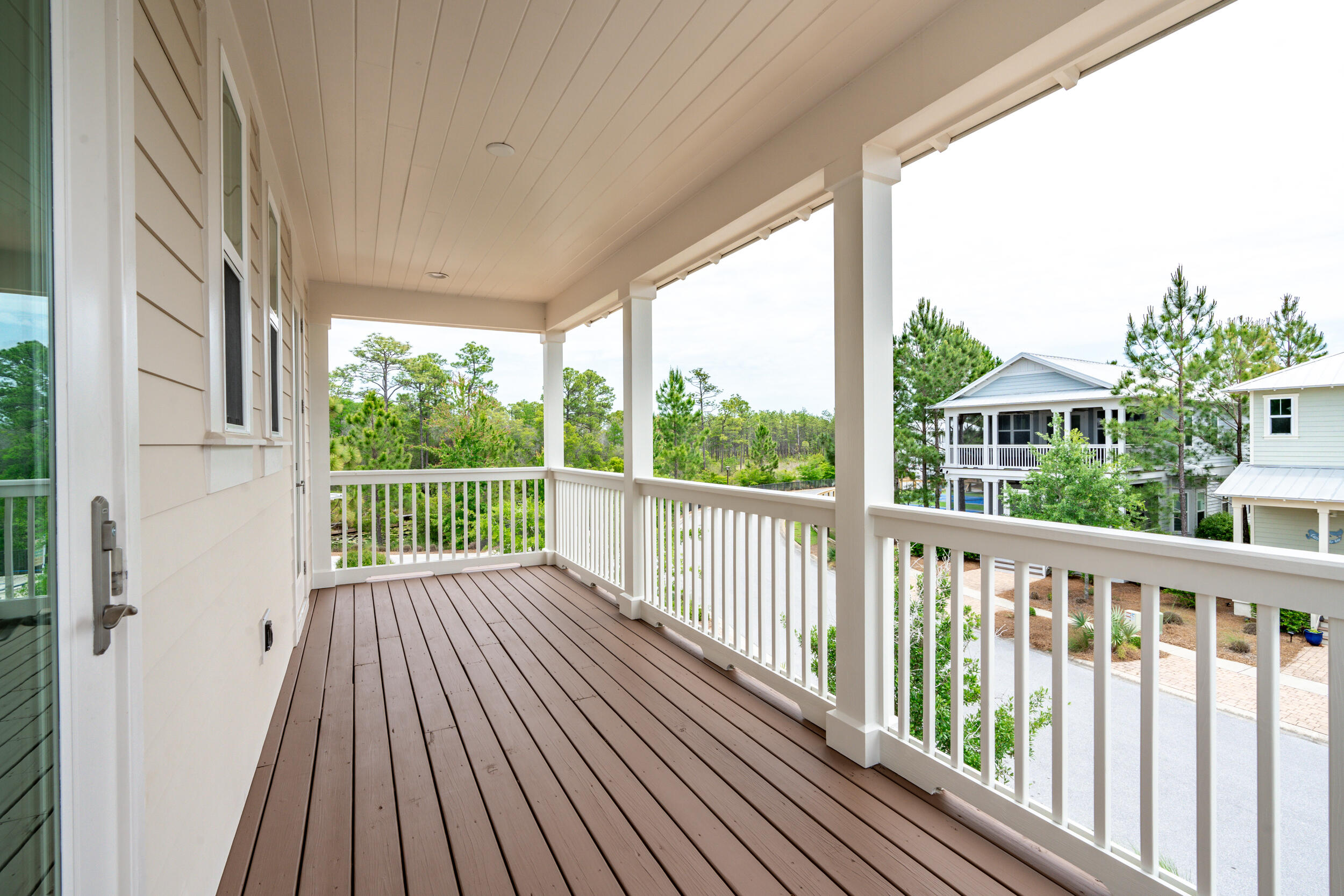 345 Flatwoods Forest Loop Santa Rosa Beach, FL 32459 - Photo 35 of 62 a view of balcony with wooden floor