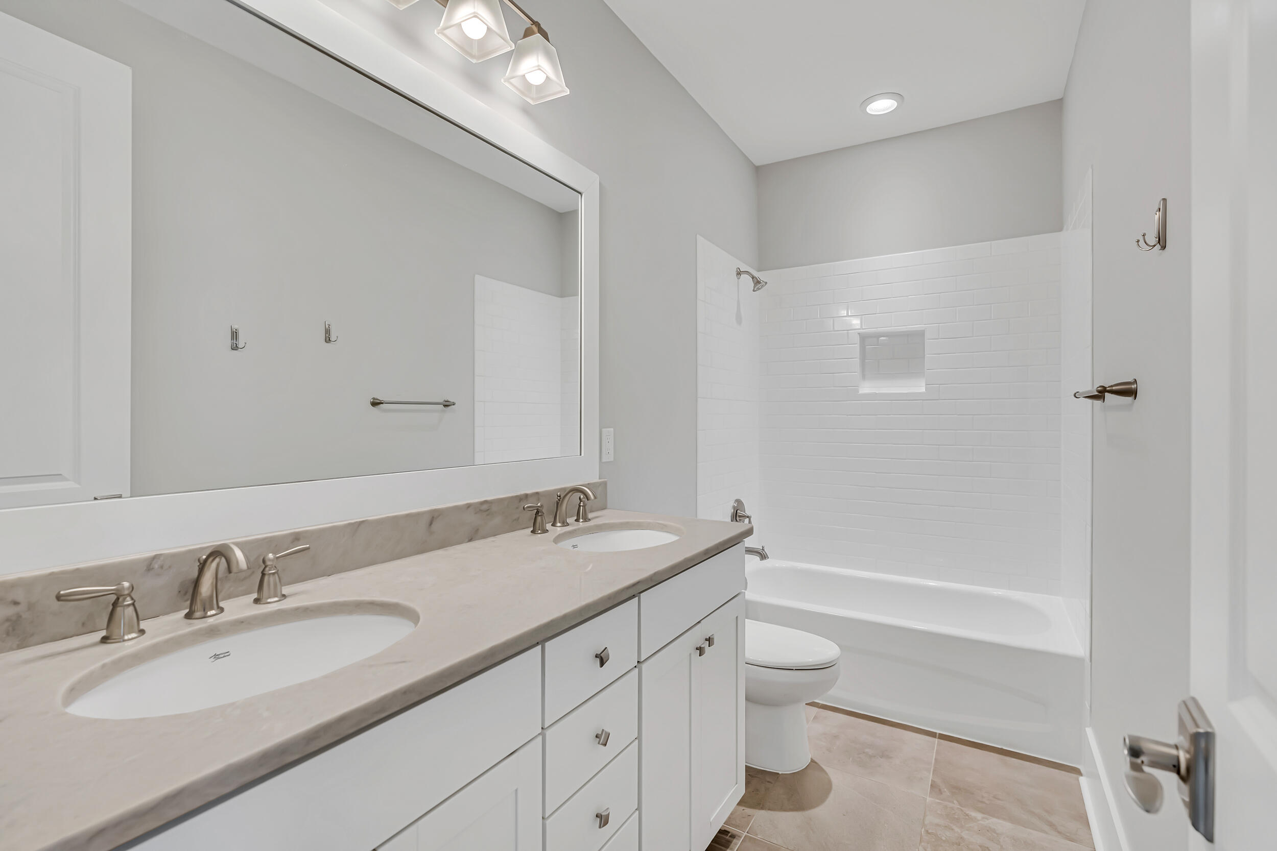 345 Flatwoods Forest Loop Santa Rosa Beach, FL 32459 - Photo 39 of 62 a bathroom with a granite countertop sink toilet and shower