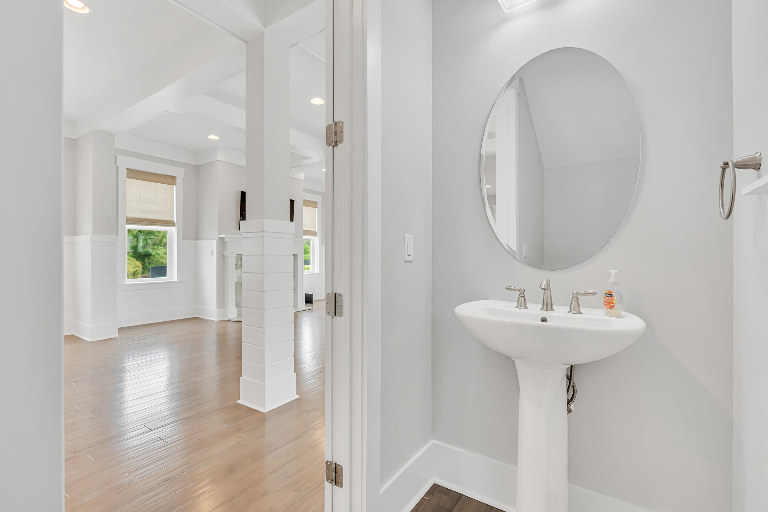 345 Flatwoods Forest Loop Santa Rosa Beach, FL 32459 - Photo 40 of 62 a bathroom with a sink a mirror and a shower