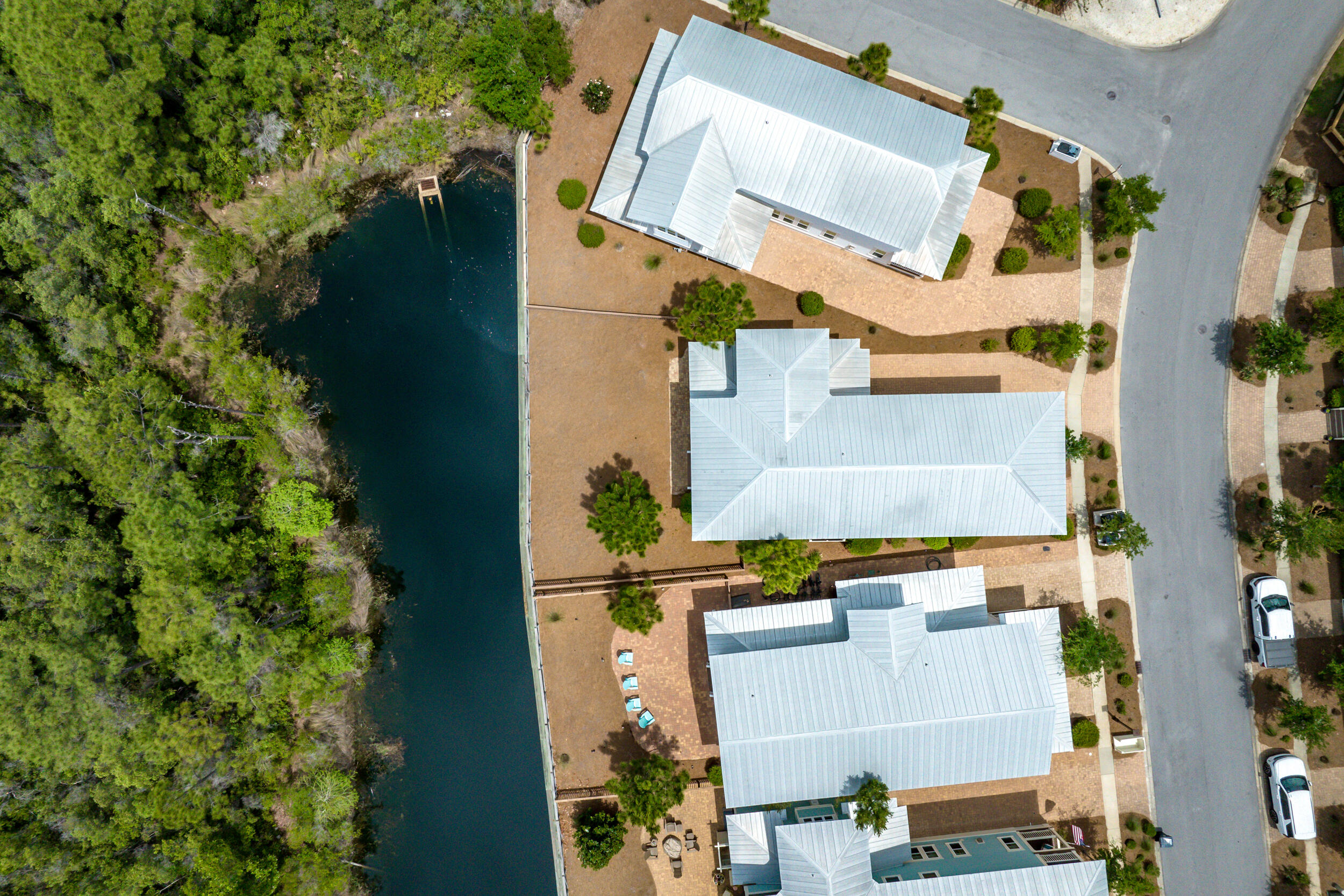345 Flatwoods Forest Loop Santa Rosa Beach, FL 32459 - Photo 51 of 62 an aerial view of residential houses with outdoor space