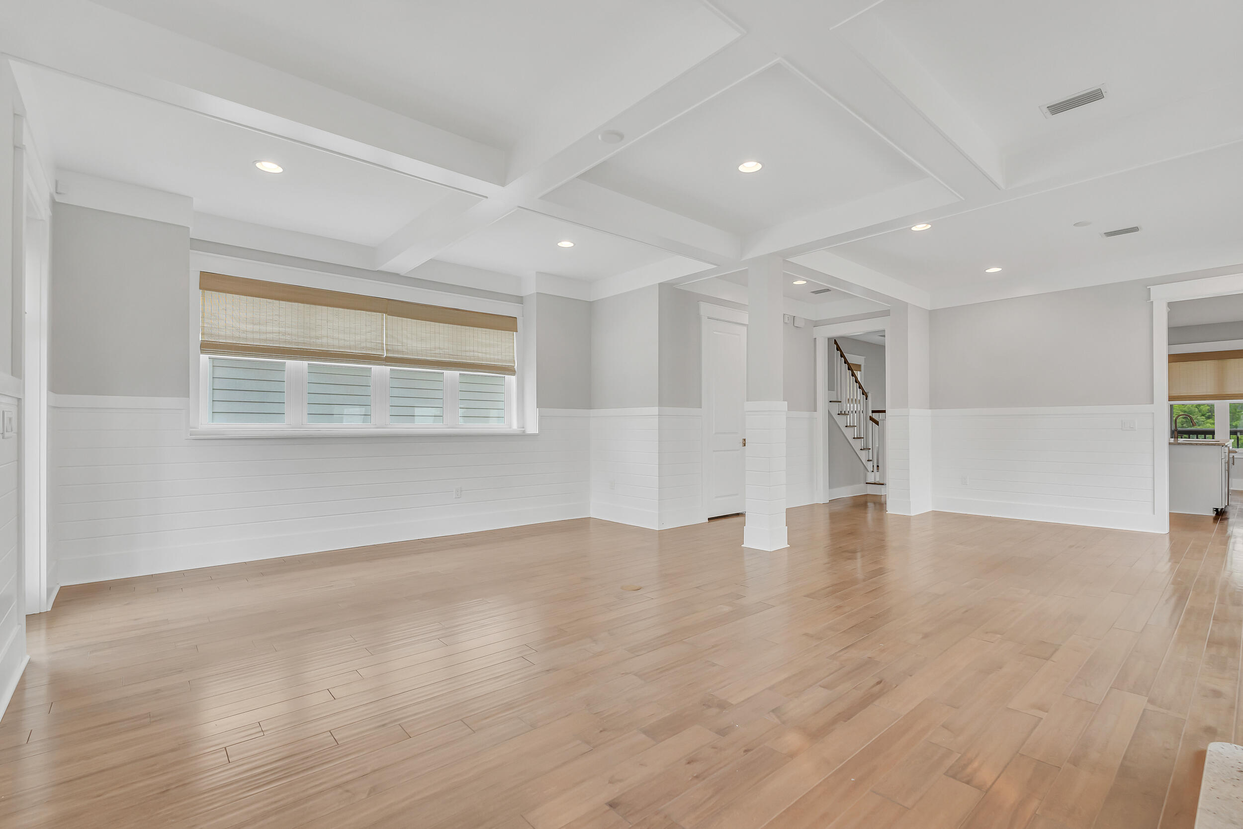 345 Flatwoods Forest Loop Santa Rosa Beach, FL 32459 - Photo 9 of 62 a view of an empty room with wooden floor and a window