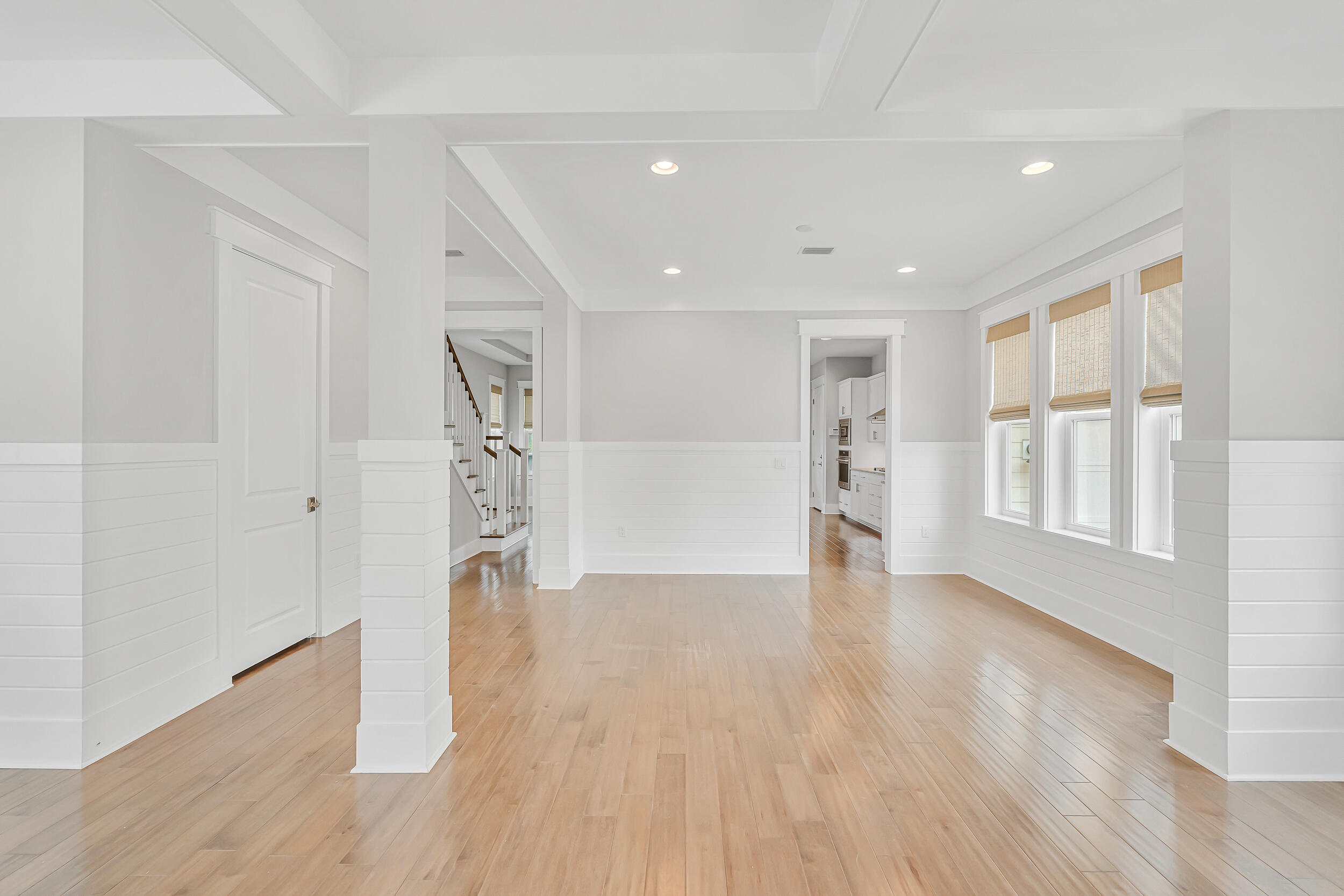 345 Flatwoods Forest Loop Santa Rosa Beach, FL 32459 - Photo 10 of 62 a view of empty room with wooden floor and entryway