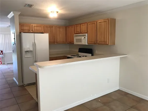 a utility room with washer and dryer