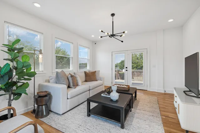 a view of a kitchen with a sink and a window