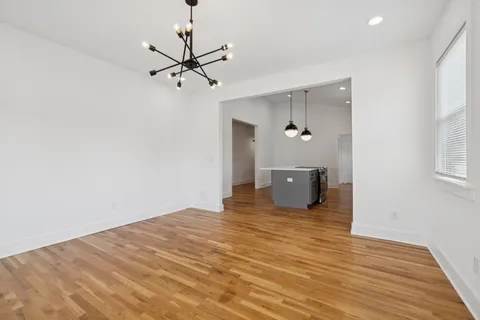 a bathroom with a double vanity sink and mirror