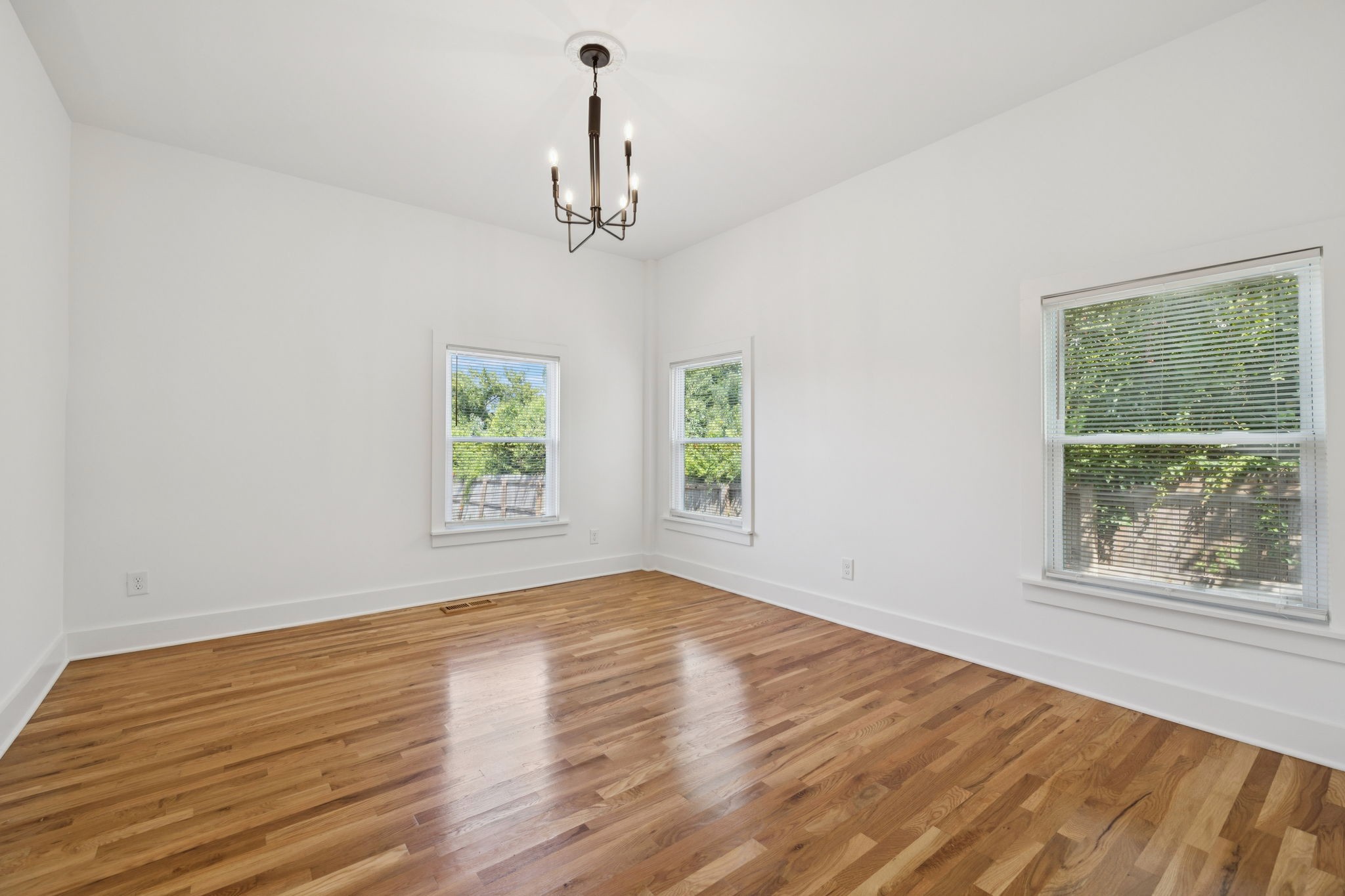 1613 23rd Avenue North Nashville, TN 37208 - Photo 21 of 58 a view of room with window and hardwood floor