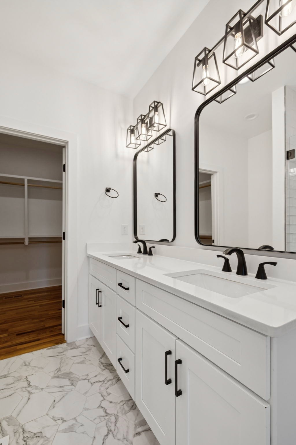 1613 23rd Avenue North Nashville, TN 37208 - Photo 23 of 58 a bathroom with a double vanity sink and mirror