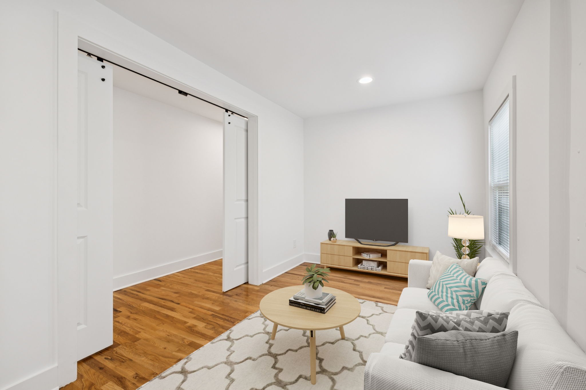 1613 23rd Avenue North Nashville, TN 37208 - Photo 27 of 58 a bedroom with a bed and flat screen tv