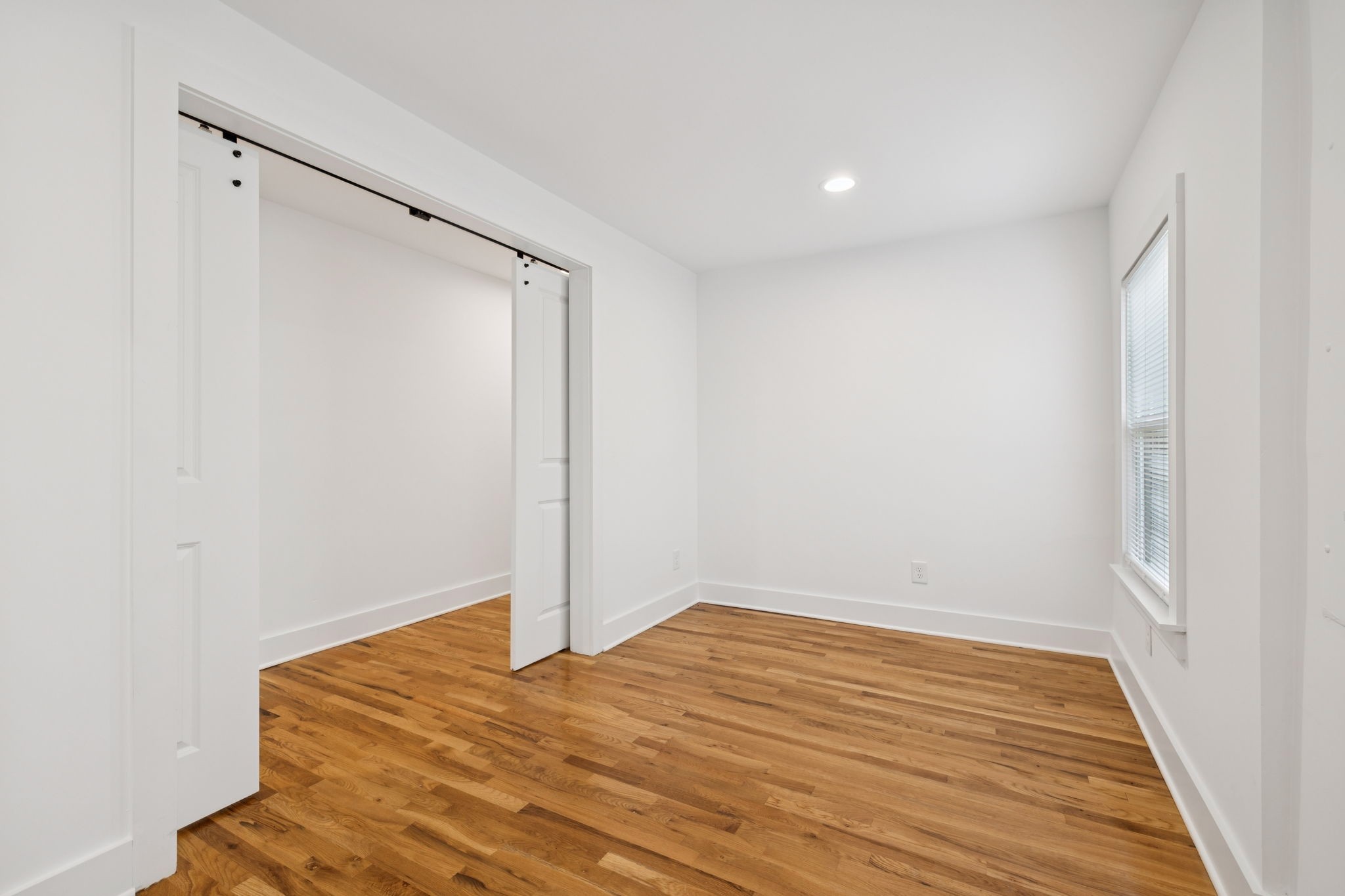 1613 23rd Avenue North Nashville, TN 37208 - Photo 29 of 58 a view of empty room with wooden floor