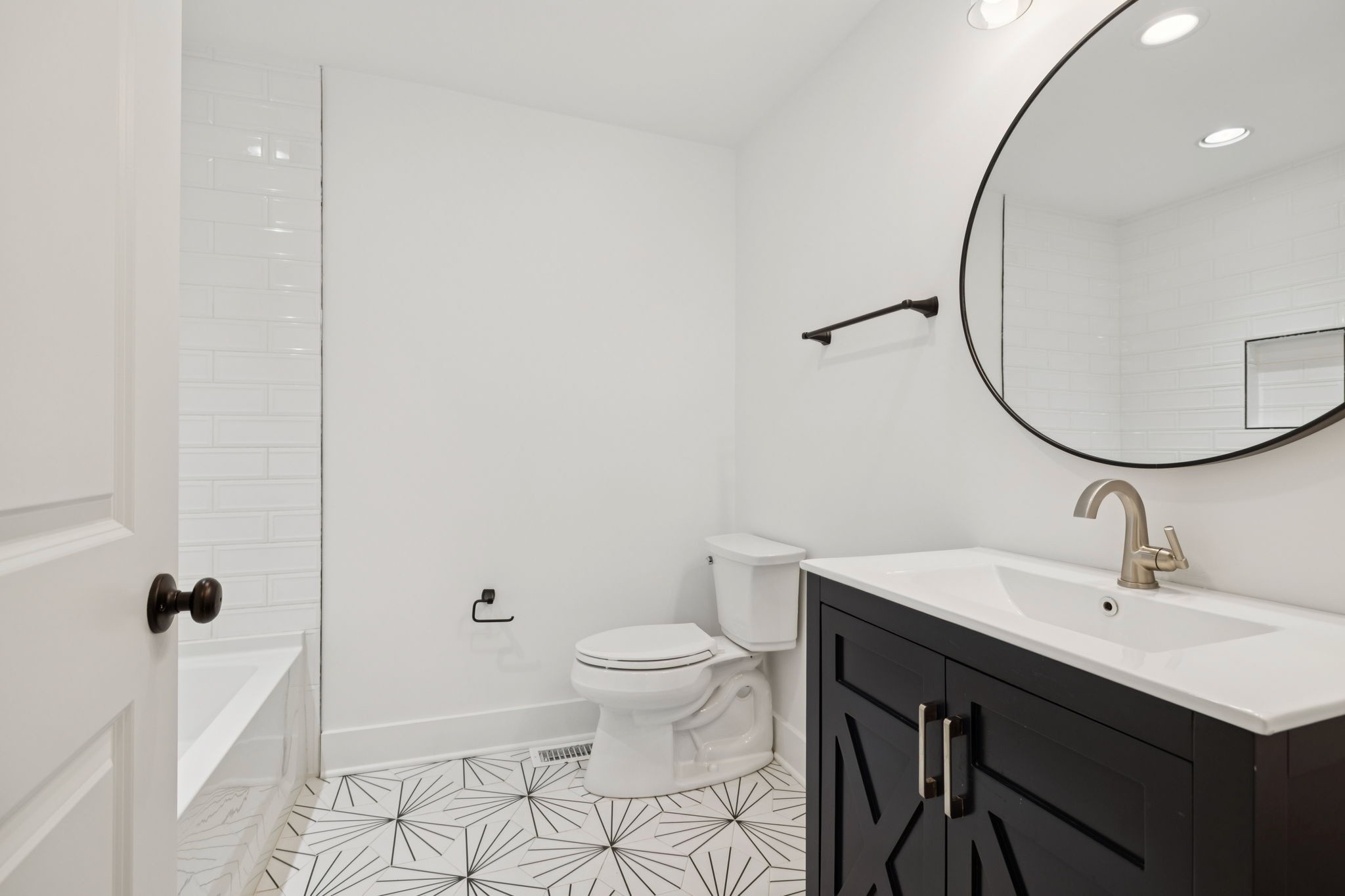 1613 23rd Avenue North Nashville, TN 37208 - Photo 34 of 58 a bathroom with a sink toilet and a mirror
