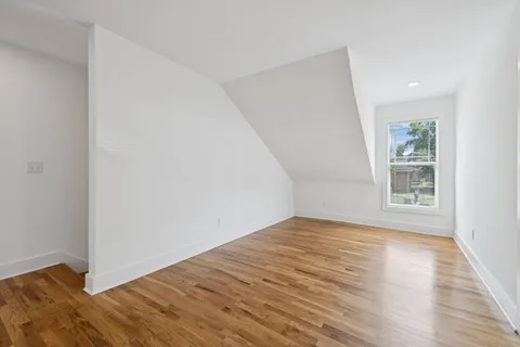 a view of a backyard with a small cabin