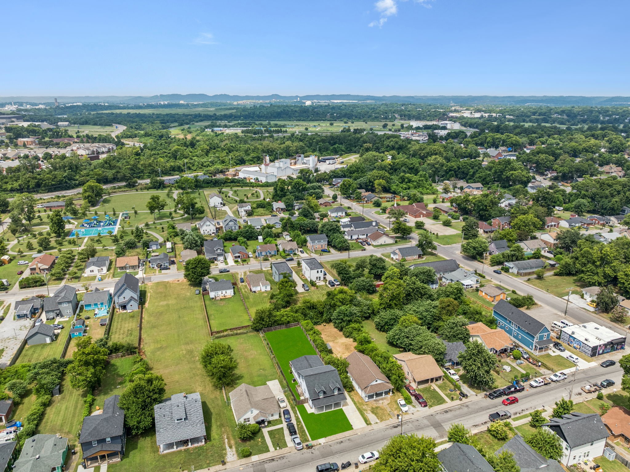 1613 23rd Avenue North Nashville, TN 37208 - Photo 53 of 58 an aerial view of residential houses with outdoor space and trees