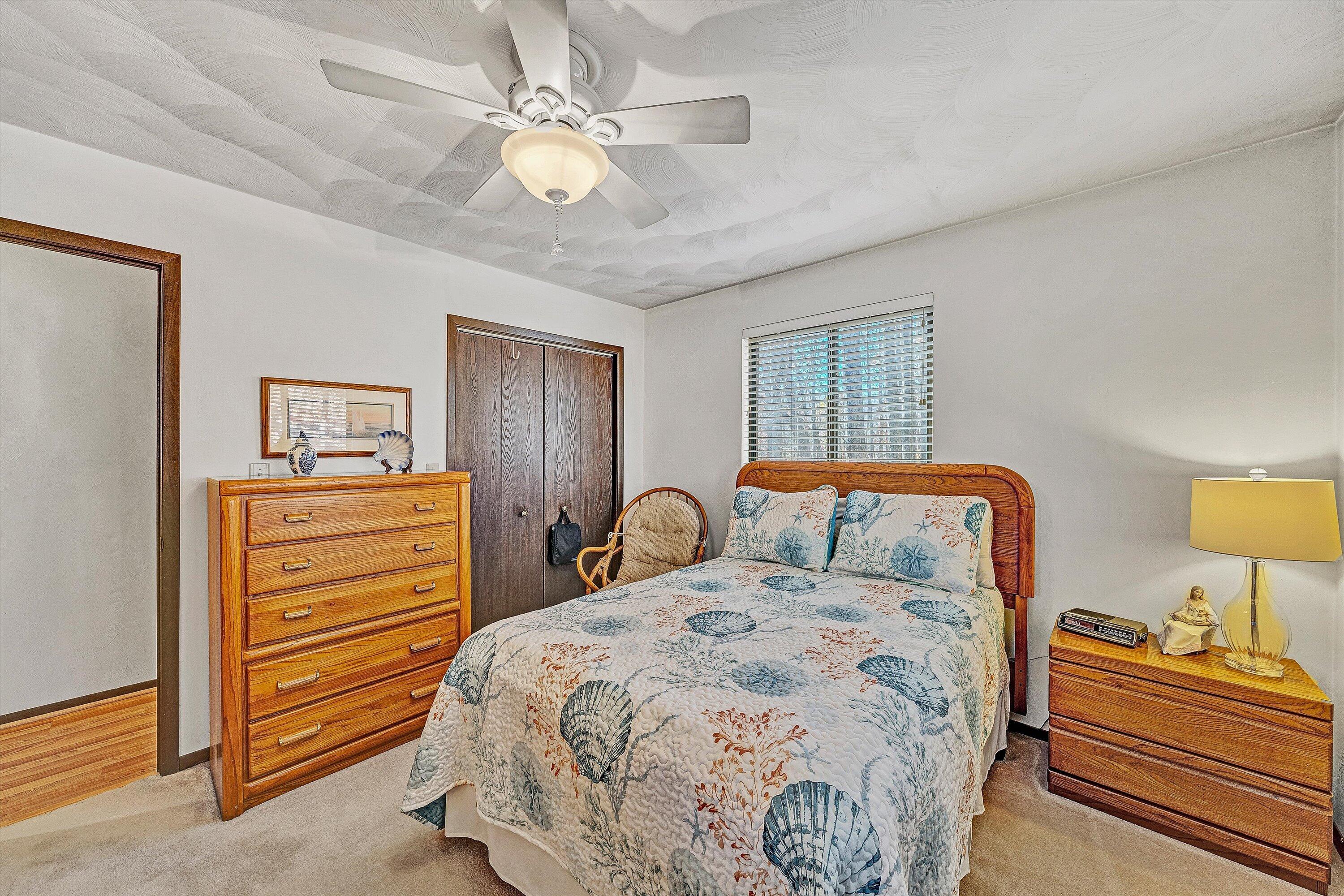 1046 Mountain Pass Road Blue Ridge, VA 24064 - Photo 17 of 25 a bedroom with a bed and wooden floor