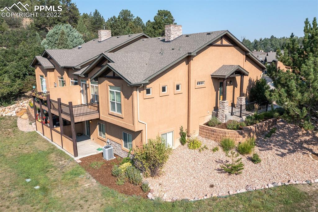 2361 Conservatory Point Colorado Springs, CO 80918 - Photo 3 of 50 a aerial view of a house with a yard
