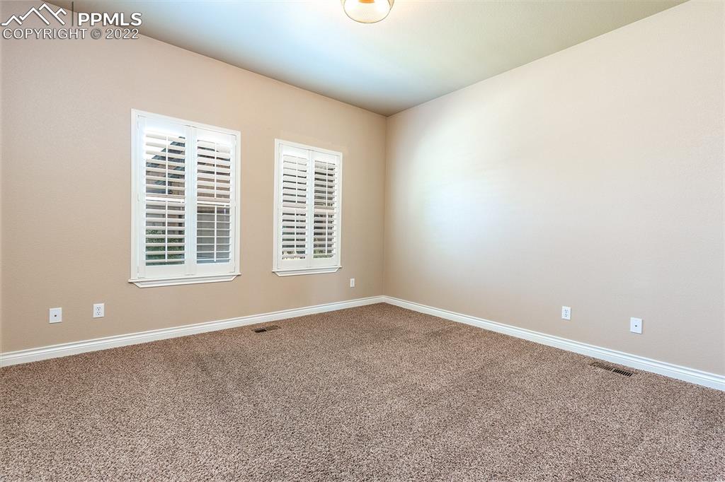 2361 Conservatory Point Colorado Springs, CO 80918 - Photo 34 of 50 an empty room with windows