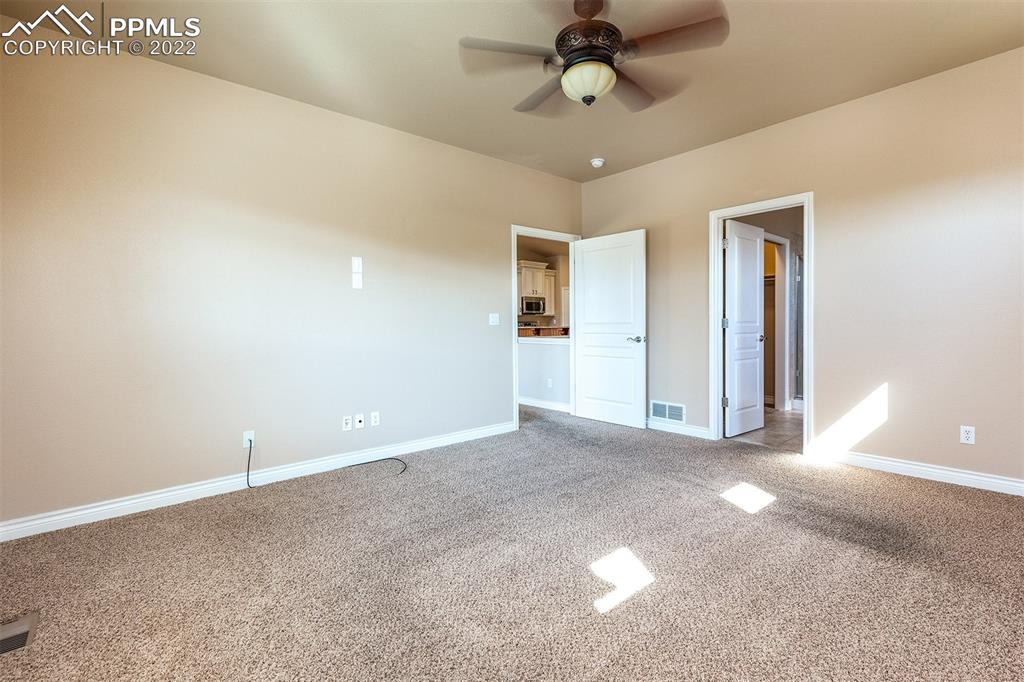 2361 Conservatory Point Colorado Springs, CO 80918 - Photo 38 of 50 a view of a big room with a ceiling fan