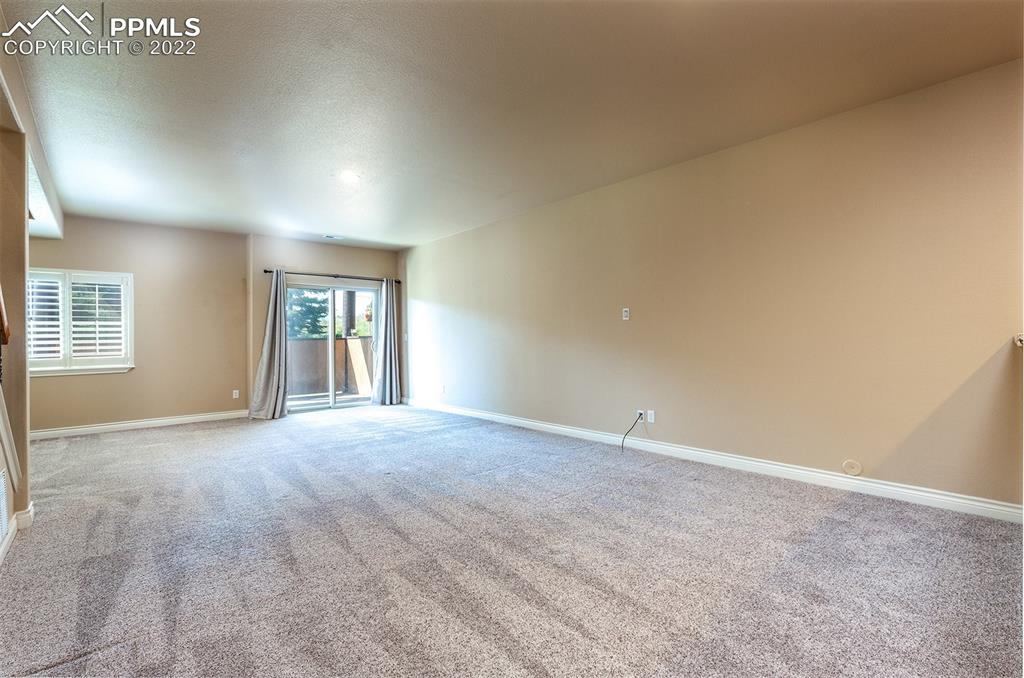 2361 Conservatory Point Colorado Springs, CO 80918 - Photo 43 of 50 an empty room with windows and closet