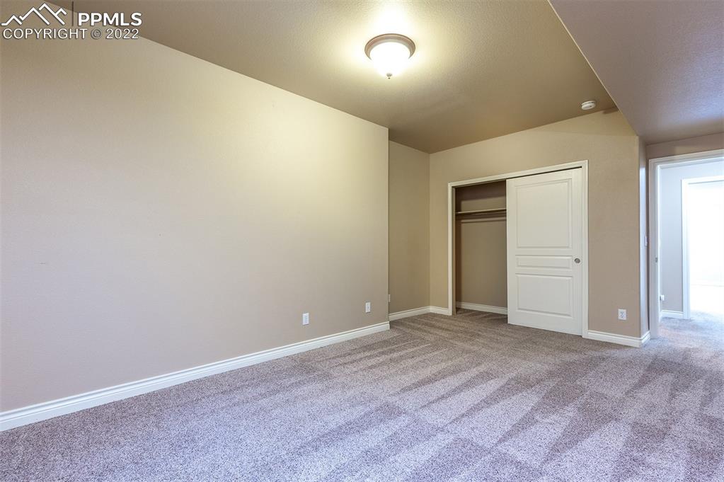 2361 Conservatory Point Colorado Springs, CO 80918 - Photo 44 of 50 an empty room with an entryway