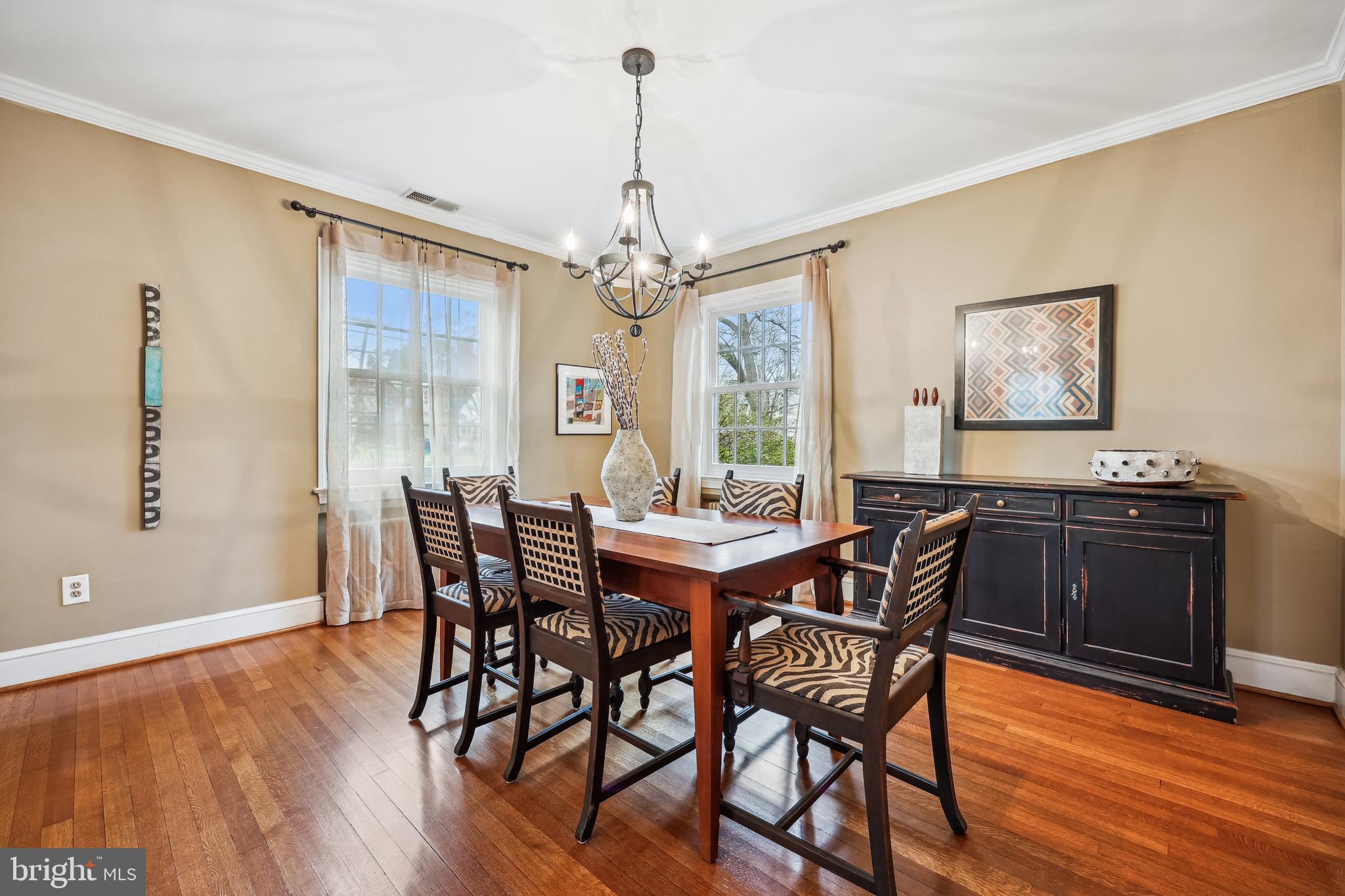 9014 Fairview Road Silver Spring, MD 20910 - Photo 11 of 94 a view of a dining room with furniture window and wooden floor