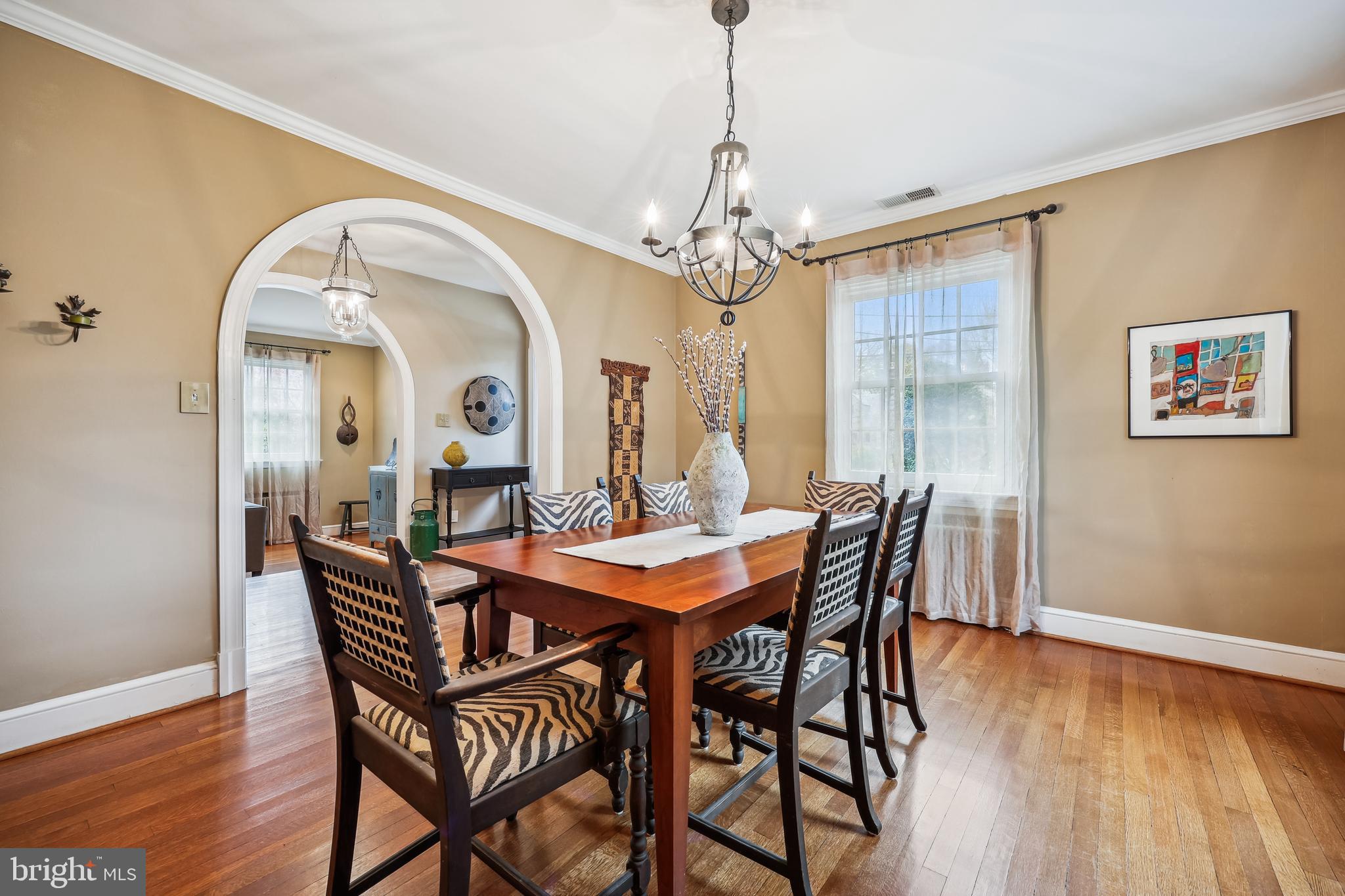 9014 Fairview Road Silver Spring, MD 20910 - Photo 13 of 94 a view of a dining room with furniture window and wooden floor