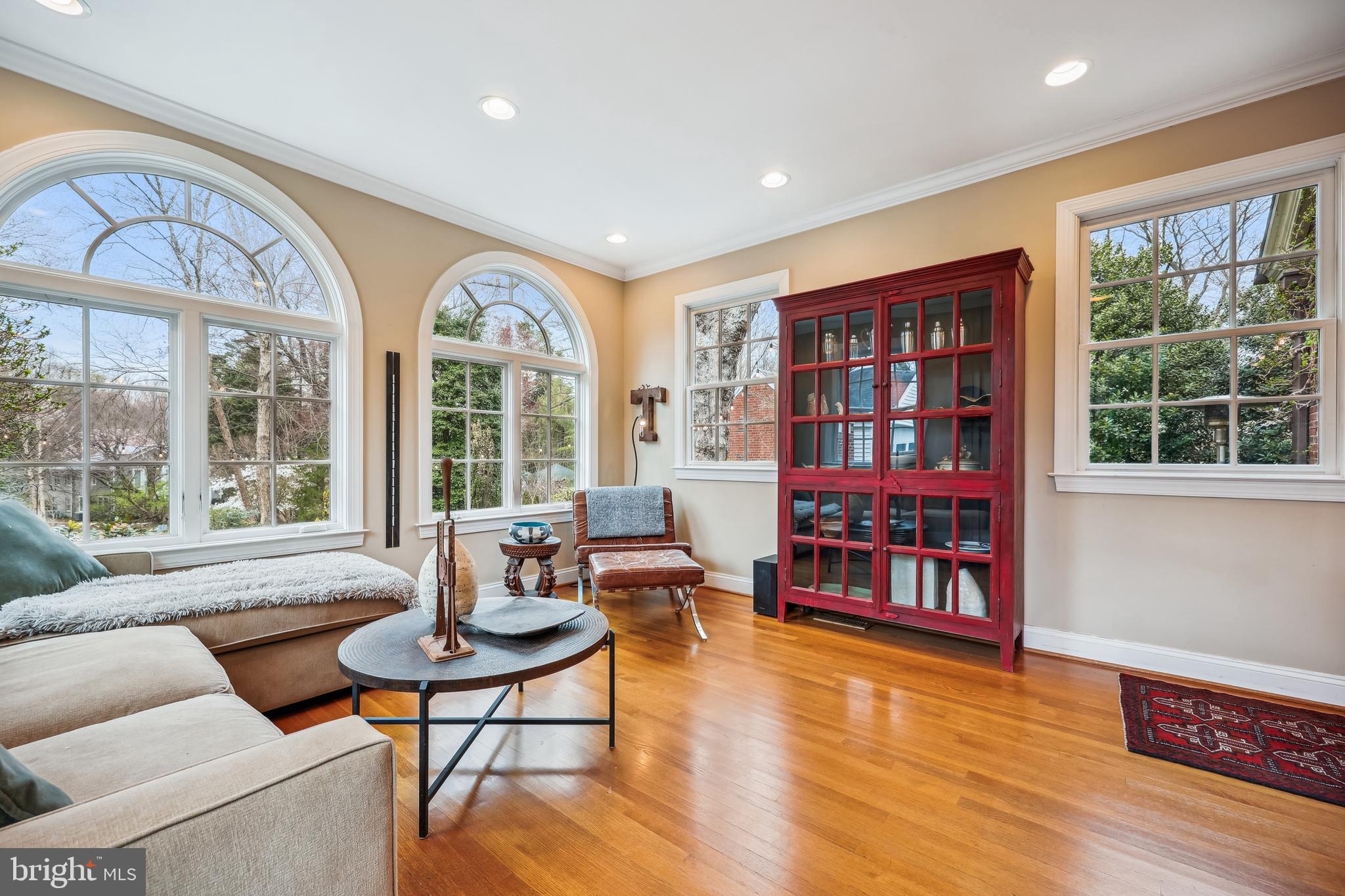 9014 Fairview Road Silver Spring, MD 20910 - Photo 20 of 94 a living room with fireplace furniture and a large window