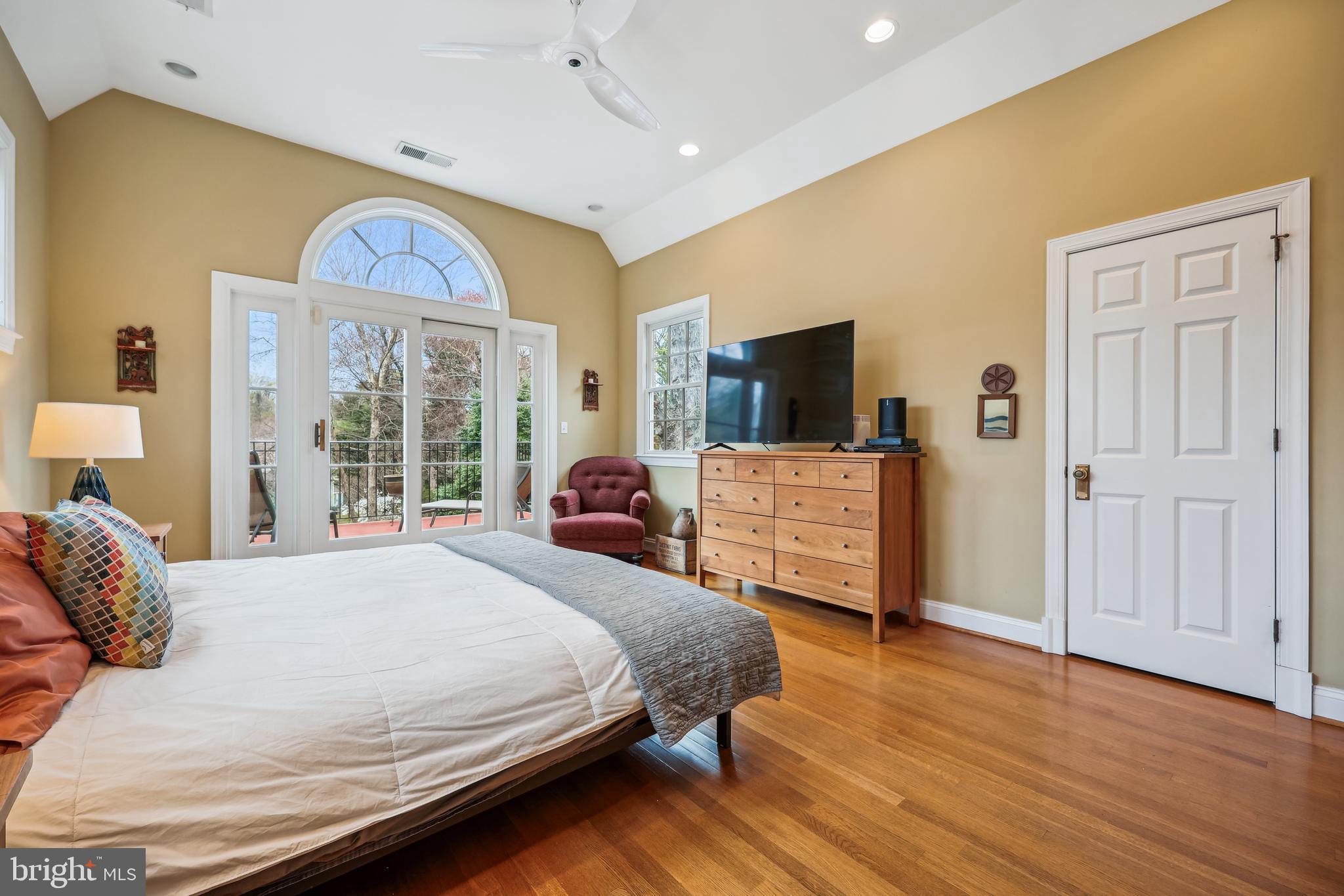 9014 Fairview Road Silver Spring, MD 20910 - Photo 33 of 94 a bedroom with a bed and wooden floor