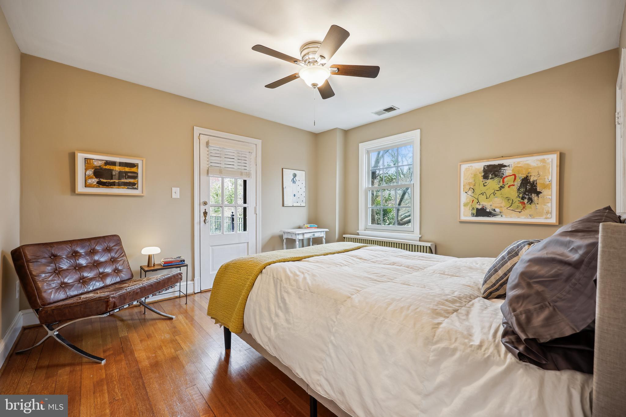 9014 Fairview Road Silver Spring, MD 20910 - Photo 41 of 94 a bed sitting in a bedroom next to a window