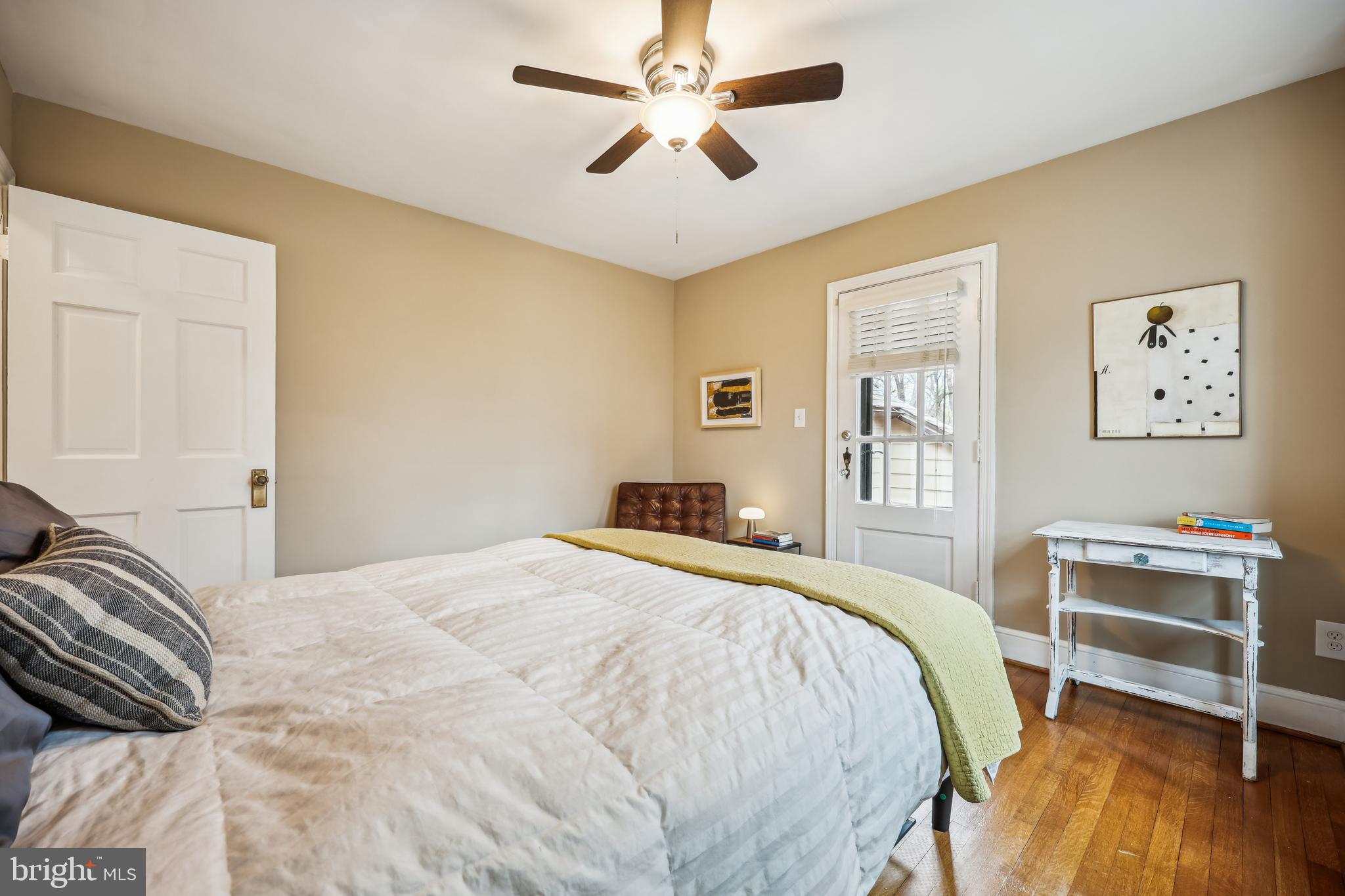 9014 Fairview Road Silver Spring, MD 20910 - Photo 42 of 94 a bedroom with a bed and a chandelier