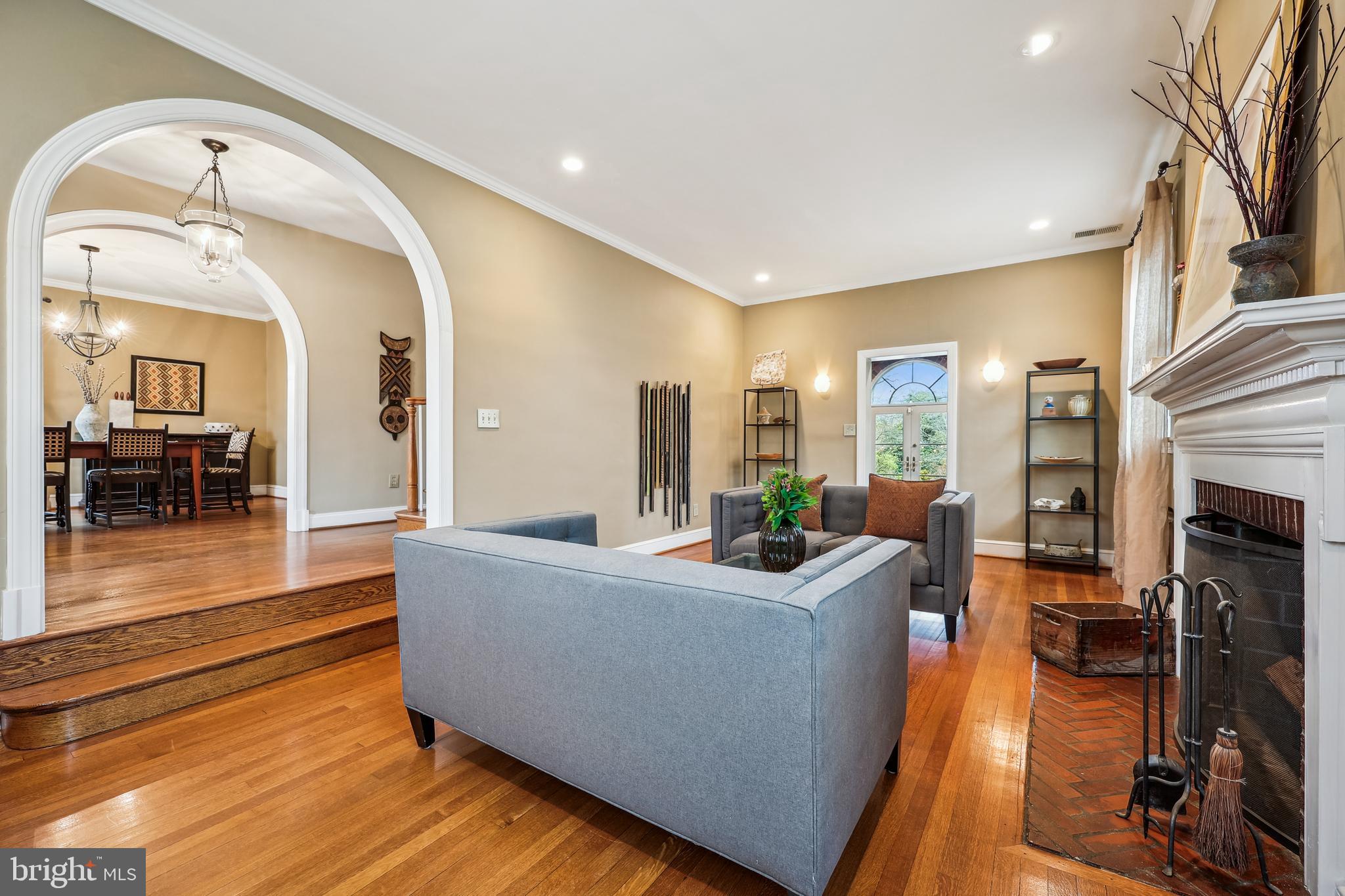 9014 Fairview Road Silver Spring, MD 20910 - Photo 5 of 94 a living room with fireplace furniture and a wooden floor