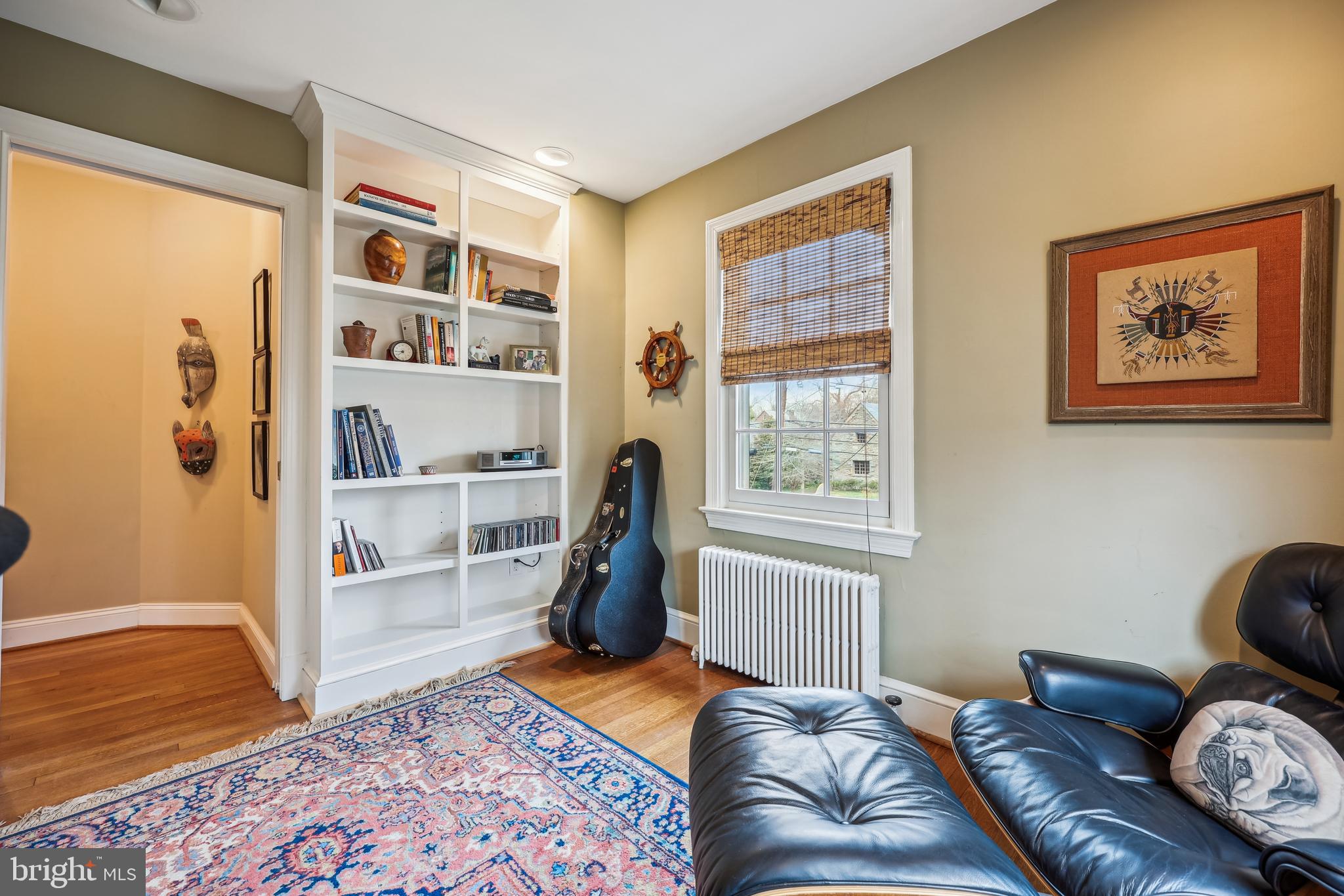 9014 Fairview Road Silver Spring, MD 20910 - Photo 51 of 94 a bedroom with furniture and a window