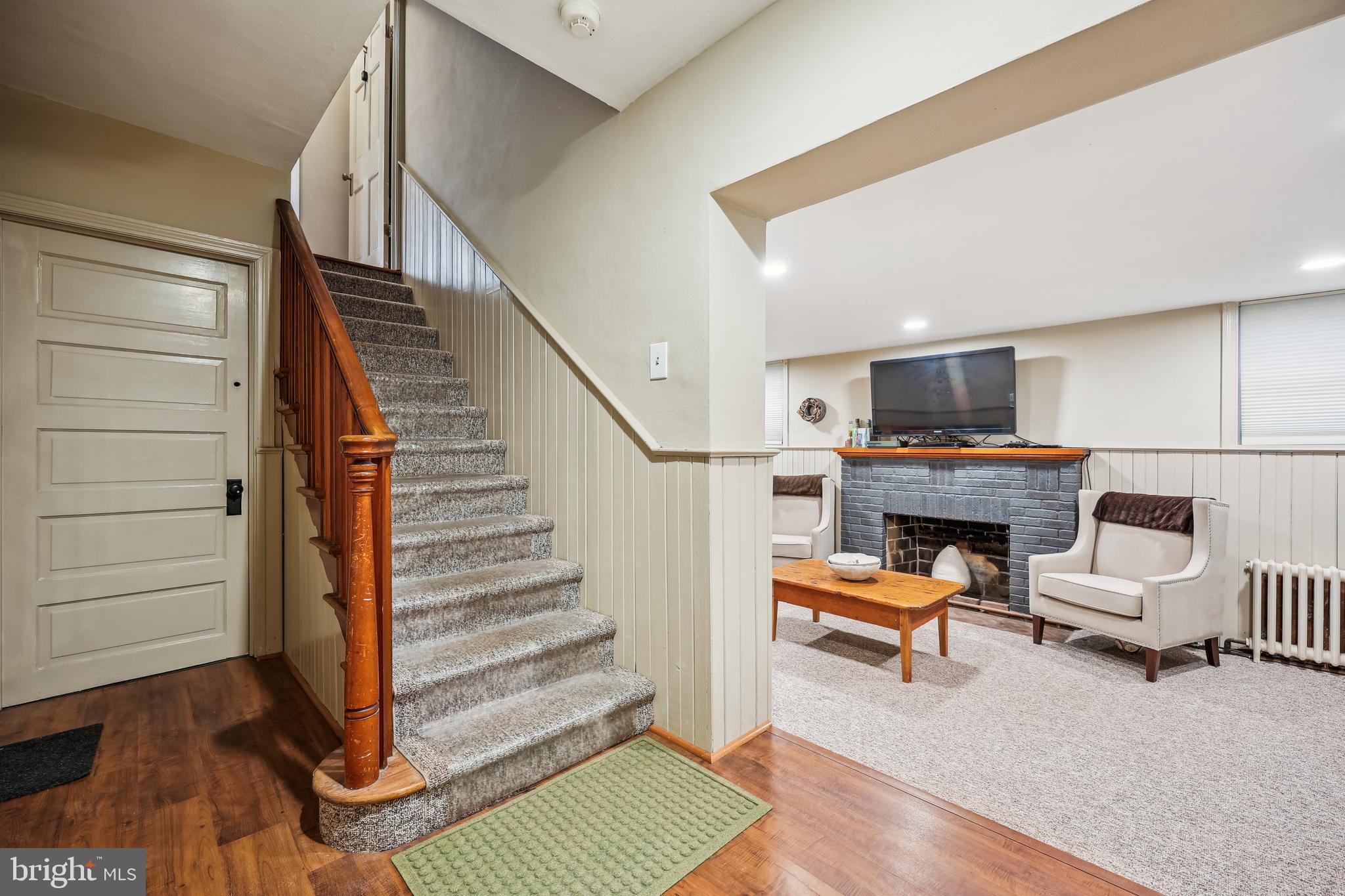 9014 Fairview Road Silver Spring, MD 20910 - Photo 60 of 94 a view of hall way with furniture and staircase