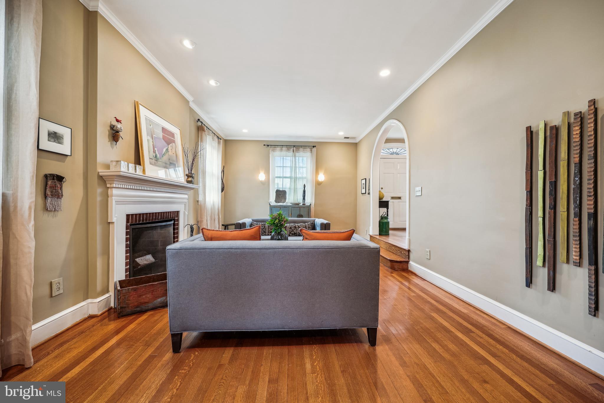 9014 Fairview Road Silver Spring, MD 20910 - Photo 8 of 94 a living room with furniture and a fireplace