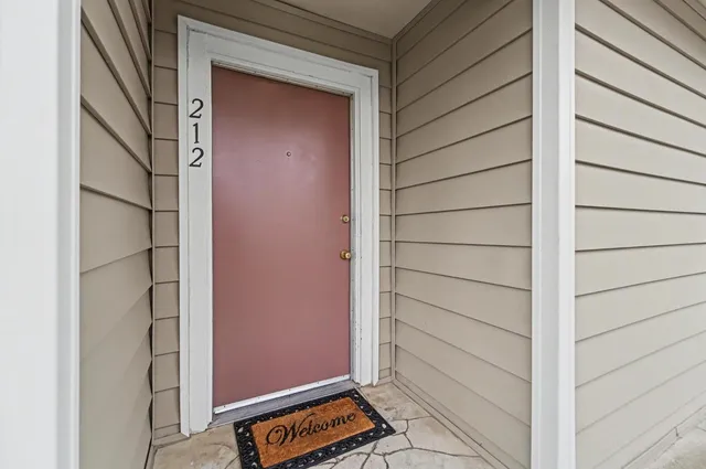 an aerial view of a residential houses with outdoor space