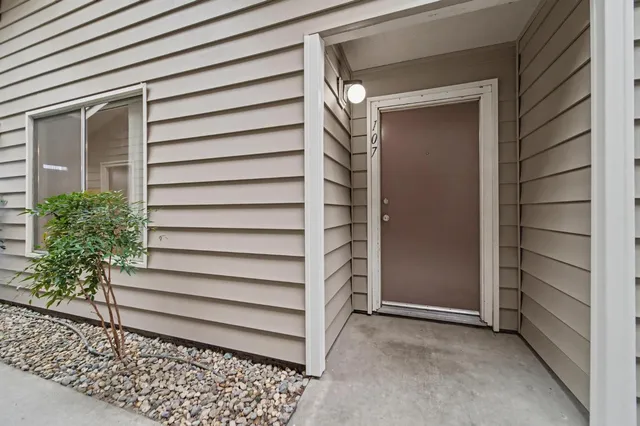 an aerial view of a city with lots of residential buildings