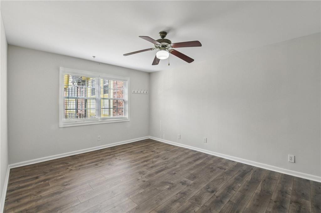 2825 Northeast Expressway, Unit F3 Atlanta, GA 30345 - Photo 33 of 45 wooden floor in an empty room with a window