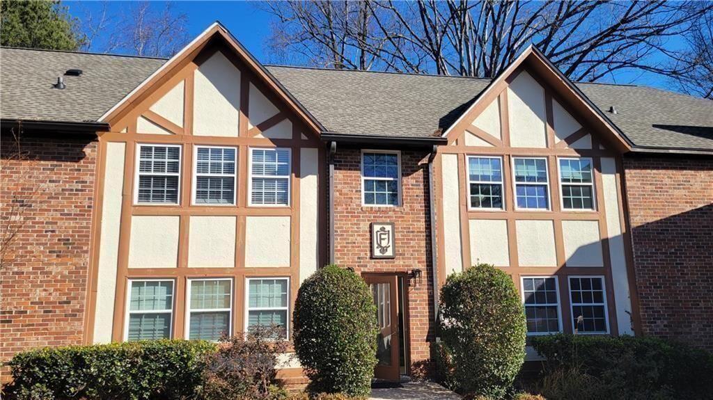 2825 Northeast Expressway, Unit F3 Atlanta, GA 30345 - Photo 43 of 45 a front view of a house with large windows